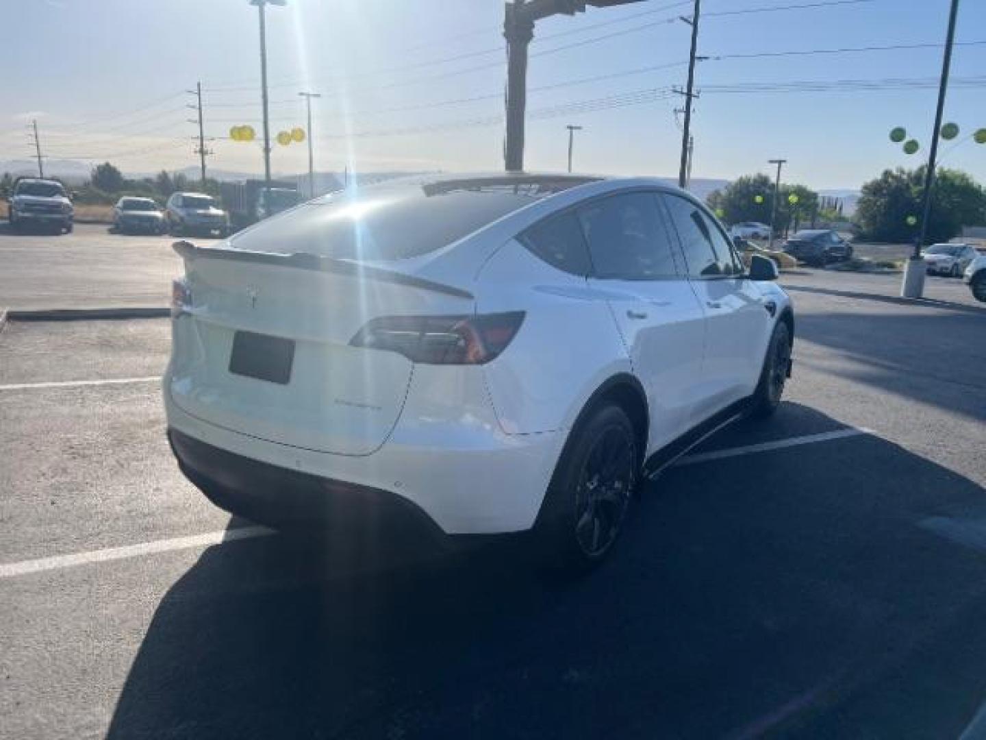 2021 Pearl White Multi-Coat /Black Tesla Model Y Long Range Dual Motor All-Wheel Drive (5YJYGDEE6MF) , Continuously Variable Transmission transmission, located at 1865 East Red Hills Pkwy, St. George, 84770, (435) 628-0023, 37.120850, -113.543640 - Photo#8