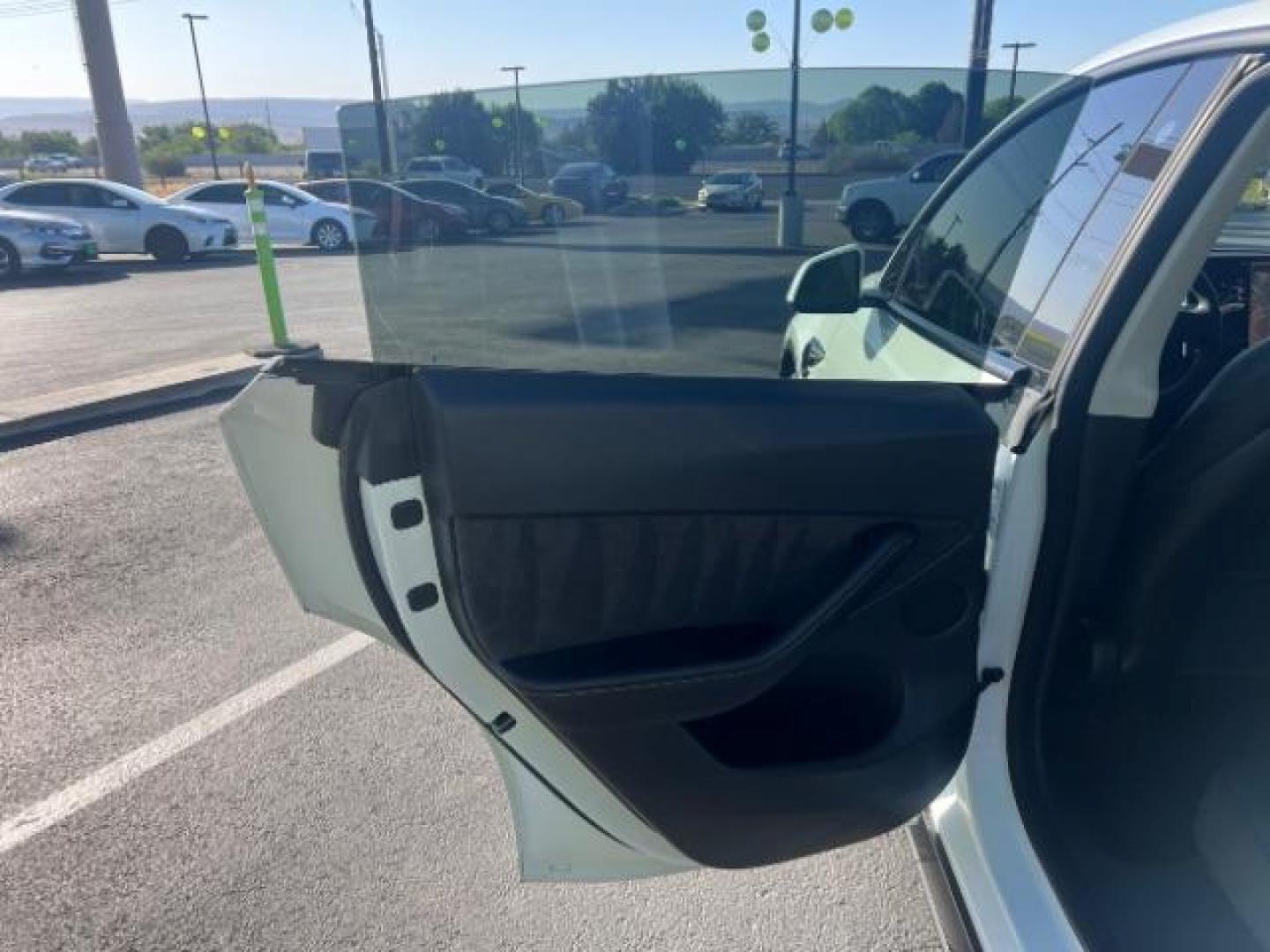 2021 Pearl White Multi-Coat /Black Tesla Model Y Long Range Dual Motor All-Wheel Drive (5YJYGDEE6MF) , Continuously Variable Transmission transmission, located at 1865 East Red Hills Pkwy, St. George, 84770, (435) 628-0023, 37.120850, -113.543640 - Photo#20