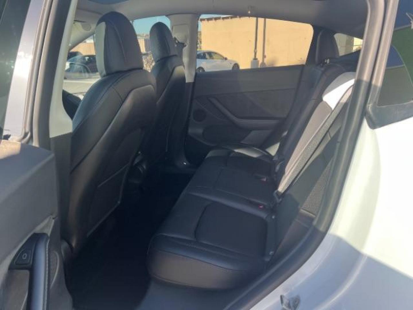 2021 Pearl White Multi-Coat /Black Tesla Model Y Long Range Dual Motor All-Wheel Drive (5YJYGDEE6MF) , Continuously Variable Transmission transmission, located at 1865 East Red Hills Pkwy, St. George, 84770, (435) 628-0023, 37.120850, -113.543640 - Photo#21