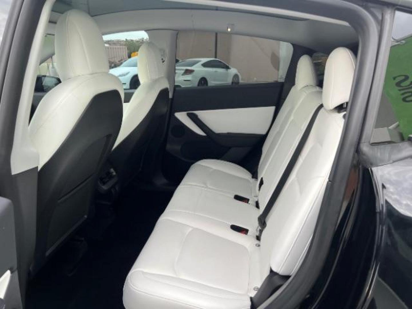 2022 Midnight Silver Metallic /White/Black Tesla Model Y Performance Dual Motor All-Wheel Drive (7SAYGDEF4NF) with an ELECTRIC engine, Continuously Variable Transmission transmission, located at 1865 East Red Hills Pkwy, St. George, 84770, (435) 628-0023, 37.120850, -113.543640 - ****Price includes $4k IRS EV REBATE**** We are setup with IRS to file the rebate directly and take credit off the price of car. Check with IRS EV website to be sure you qualify. Trump has threatened to end rebate so ACT FAST! Title branded as BUY BACK. Tesla bought car back to fix small electron - Photo#21