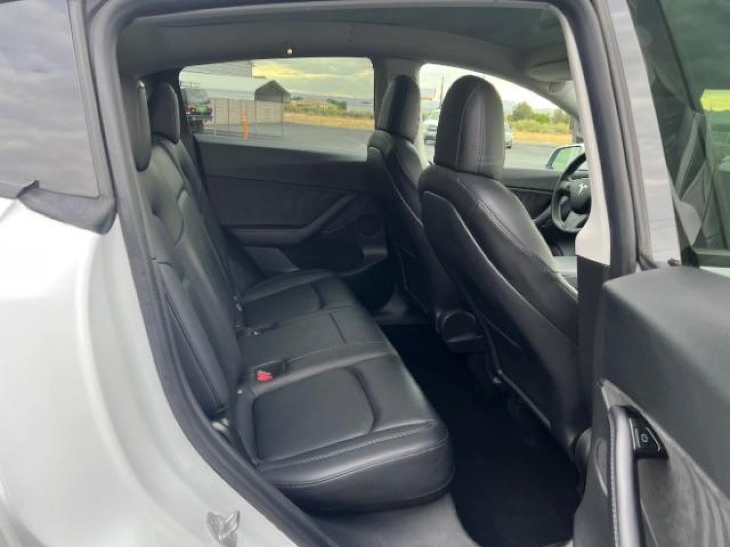 2021 Pearl White Multi-Coat /Black Tesla Model Y Long Range Dual Motor All-Wheel Drive (5YJYGDEE3MF) with an ELECTRIC engine, Continuously Variable Transmission transmission, located at 1865 East Red Hills Pkwy, St. George, 84770, (435) 628-0023, 37.120850, -113.543640 - Great condition, NEW HV Battery pack just installed by TESLA! Gets 325 miles on a full charge. Acceleration Boost Paid $2k Value Full battery and motor warranty up to 120k miles We are THE southern utah Tesla Experts. Call or text for more info - Photo#26