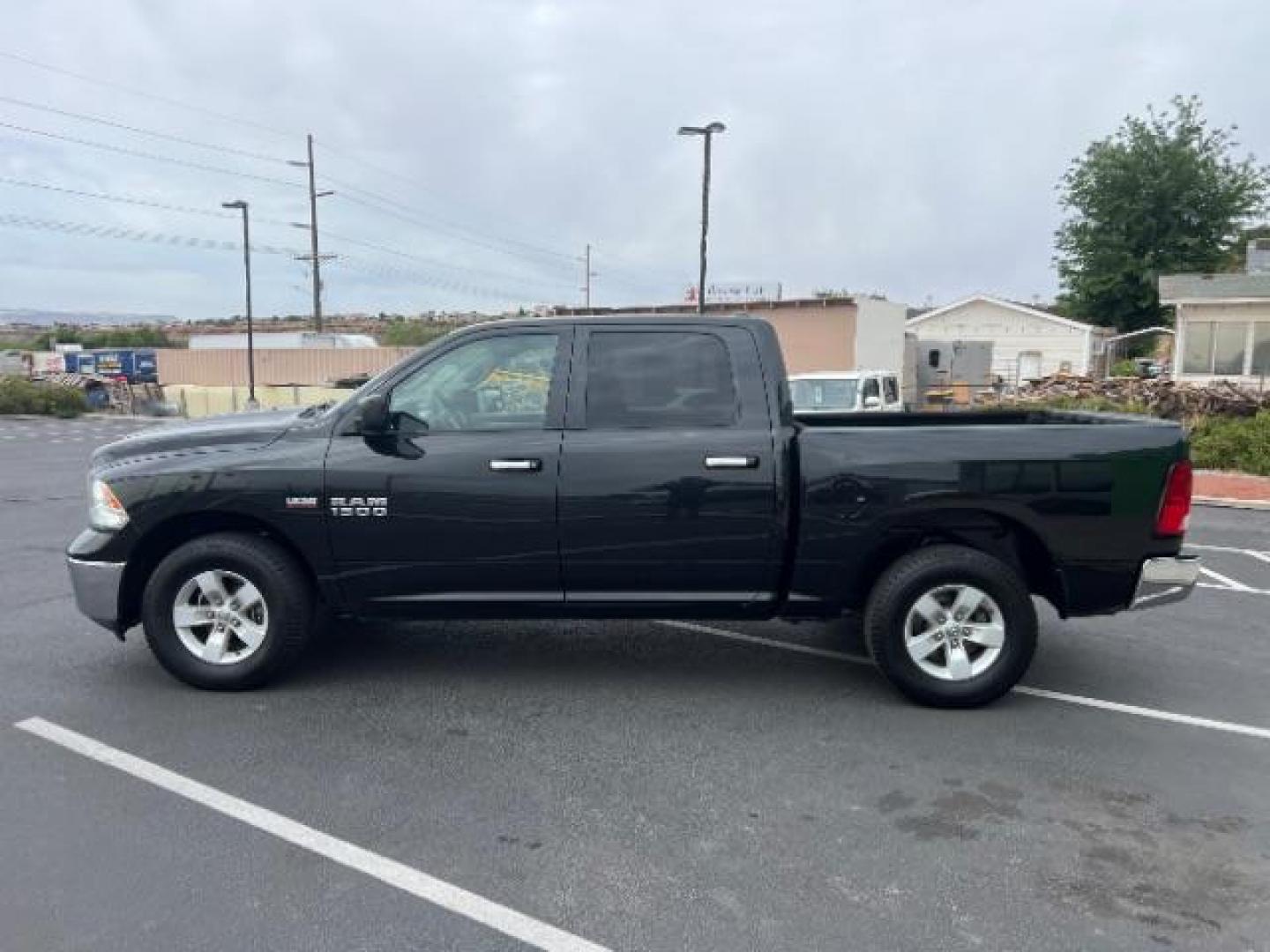 2017 Brilliant Black Crystal Pearlcoat /Diesel Gray/Black Ram 1500 SLT Crew Cab 4x4 5'7 Box (1C6RR7LT0HS) with an HEMI 5.7L V-8 variable valve control engine, located at 1865 East Red Hills Pkwy, St. George, 84770, (435) 628-0023, 37.120850, -113.543640 - We specialize in helping ALL people get the best financing available. No matter your credit score, good, bad or none we can get you an amazing rate. Had a bankruptcy, divorce, or repossessions? We give you the green light to get your credit back on the road. Low down and affordable payments that fit - Photo#3