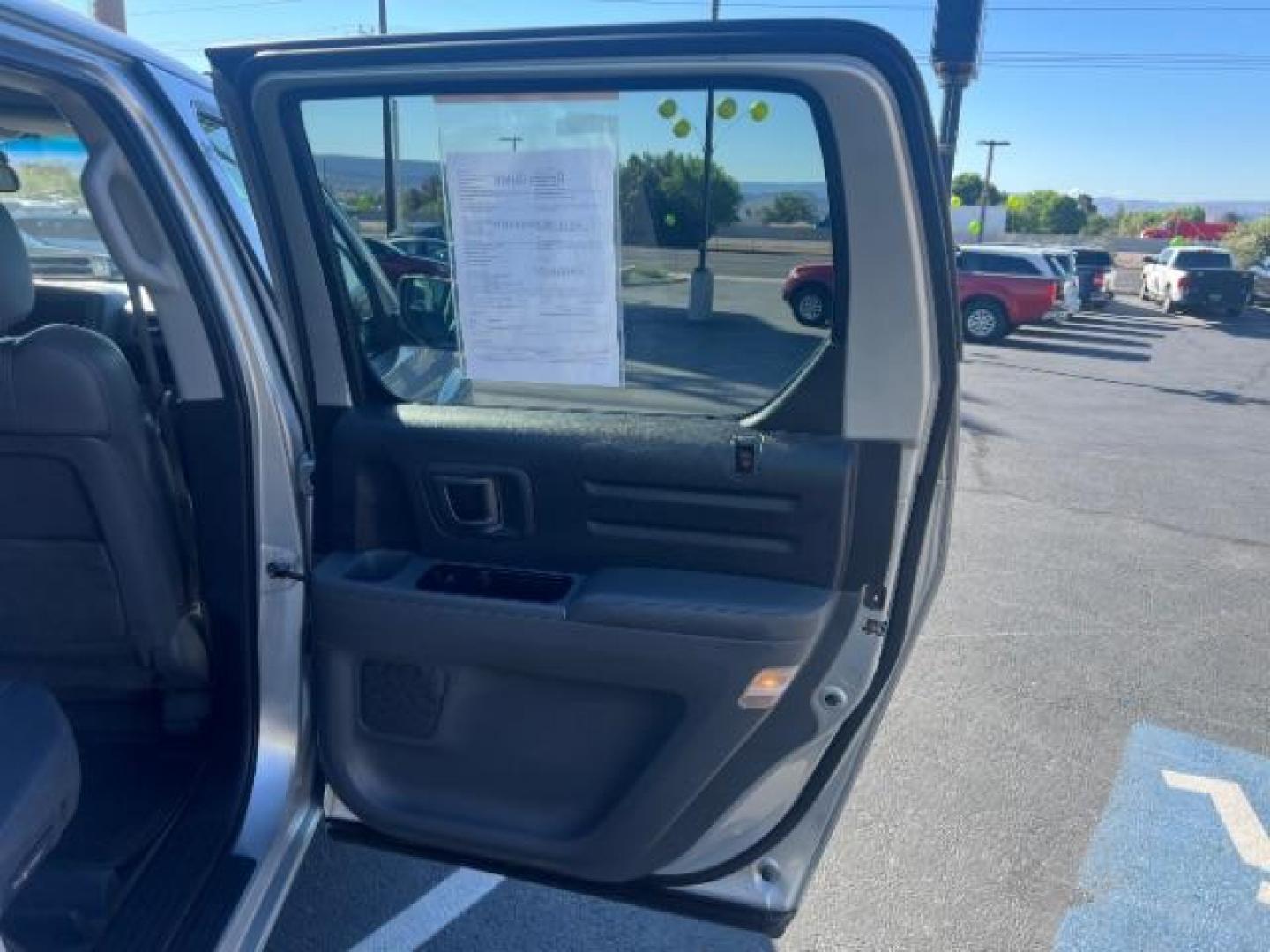 2007 Billet Silver Metallic /Gray Leather Interior Honda Ridgeline RTL (2HJYK16547H) with an 3.5L V6 SOHC 24V engine, 5-Speed Automatic transmission, located at 1865 East Red Hills Pkwy, St. George, 84770, (435) 628-0023, 37.120850, -113.543640 - Photo#25