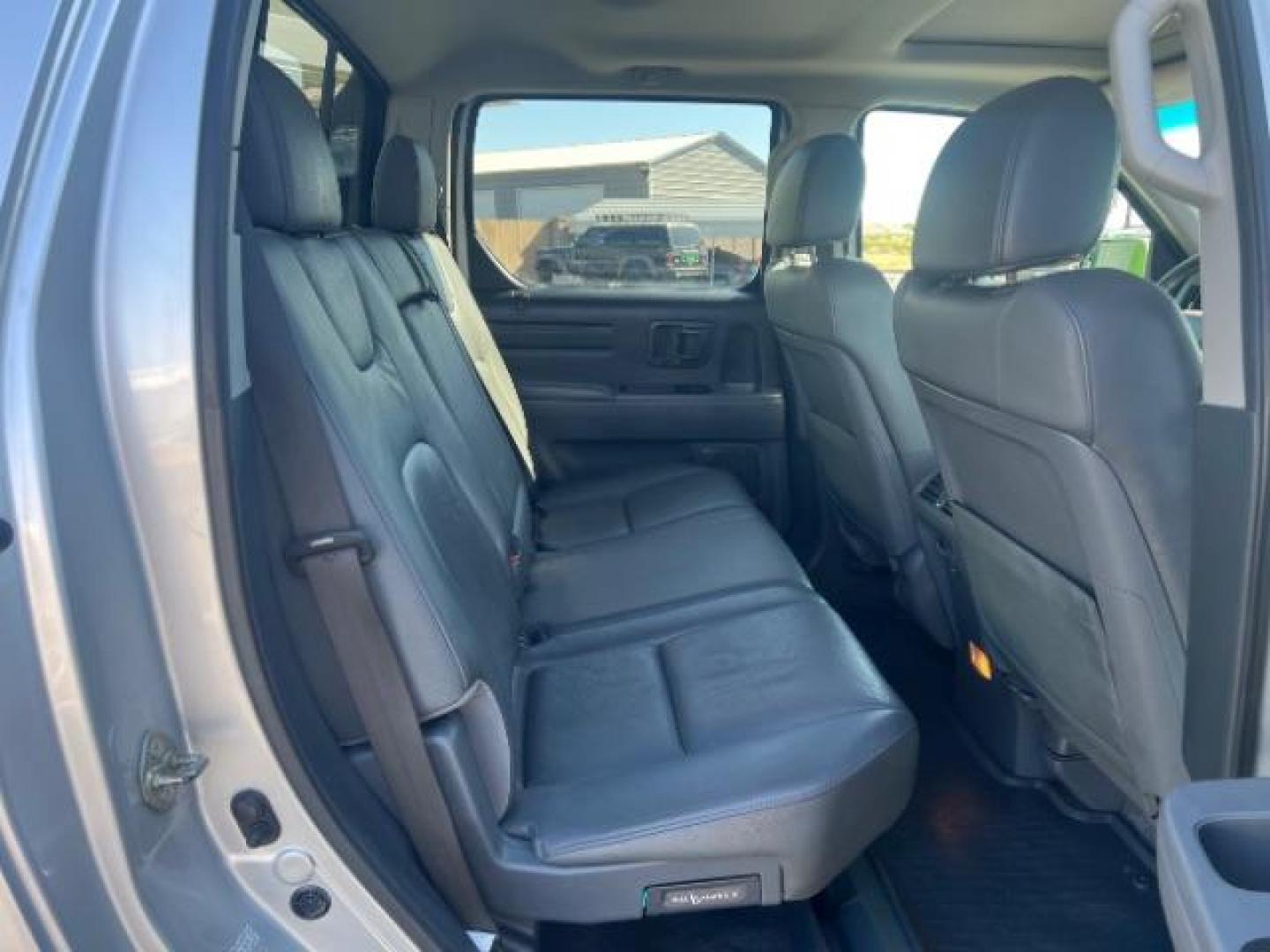 2007 Billet Silver Metallic /Gray Leather Interior Honda Ridgeline RTL (2HJYK16547H) with an 3.5L V6 SOHC 24V engine, 5-Speed Automatic transmission, located at 1865 East Red Hills Pkwy, St. George, 84770, (435) 628-0023, 37.120850, -113.543640 - Photo#26