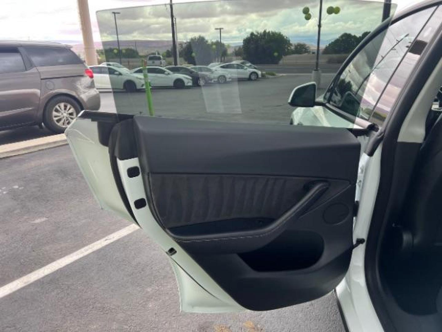 2022 Pearl White Multi-Coat /Black Tesla Model Y Long Range Dual Motor All-Wheel Drive (7SAYGDEE3NF) with an ELECTRIC engine, Continuously Variable Transmission transmission, located at 1865 East Red Hills Pkwy, St. George, 84770, (435) 628-0023, 37.120850, -113.543640 - ****Price includes $4k IRS EV REBATE**** We are setup with IRS to file the rebate directly and take credit off the price of car. Check with IRS EV website to be sure you qualify. Trump has threatened to end rebate so ACT FAST! Gets 305 miles on full charge! Acceleration Boost Paid For $2k Value - Photo#20