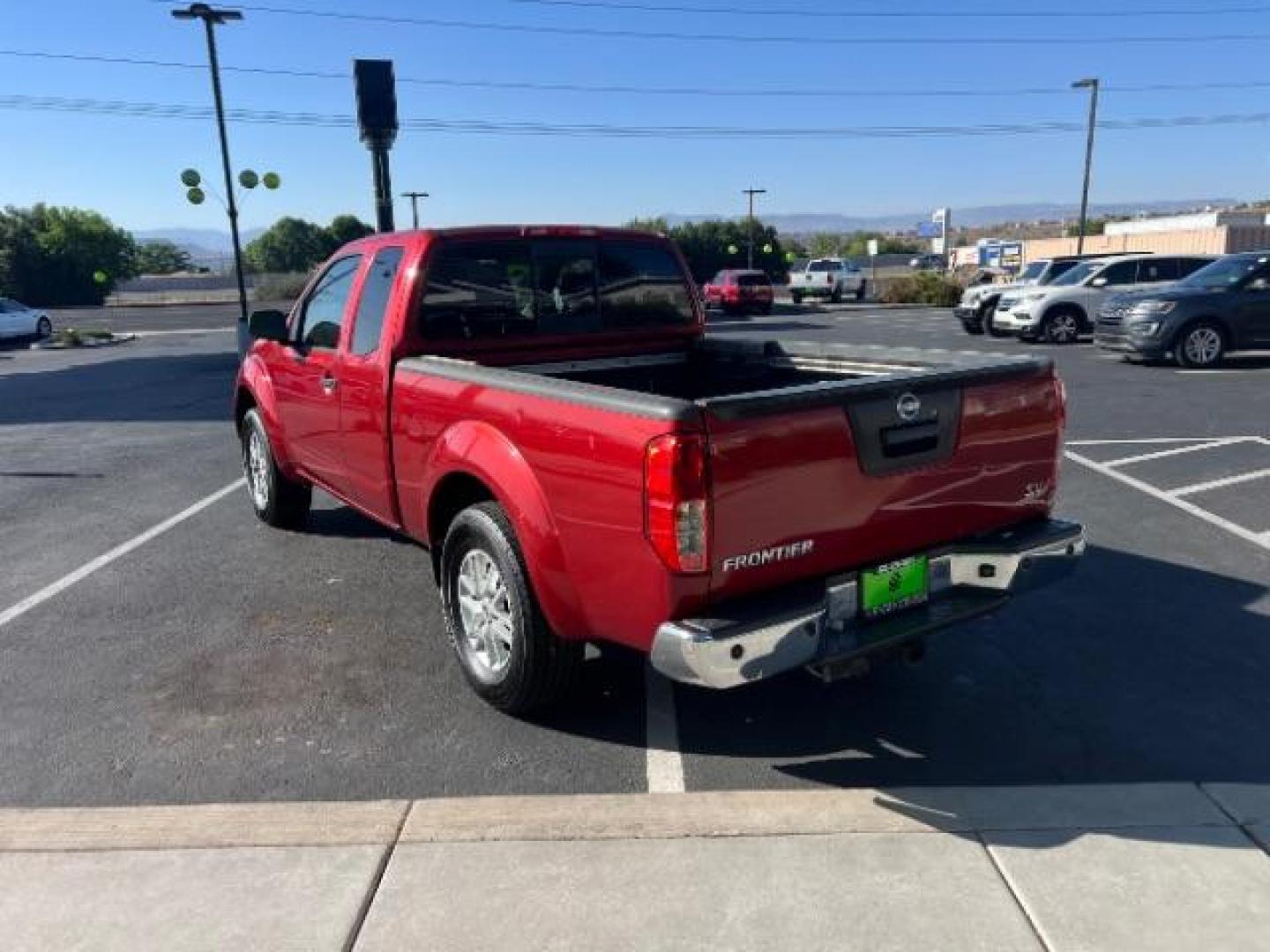 2014 Cayenne Red /Graphite Nissan Frontier SV (1N6AD0CU8EN) with an VQ 4L V-6 DOHC engine, Automatic transmission, located at 1865 East Red Hills Pkwy, St. George, 84770, (435) 628-0023, 37.120850, -113.543640 - We specialize in helping ALL people get the best financing available. No matter your credit score, good, bad or none we can get you an amazing rate. Had a bankruptcy, divorce, or repossessions? We give you the green light to get your credit back on the road. Low down and affordable payments that fit - Photo#4