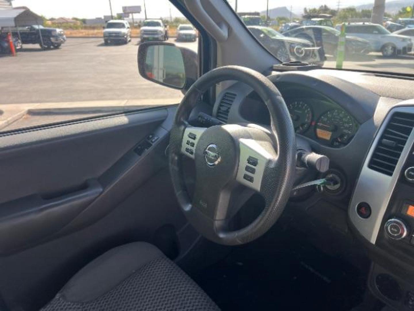 2014 Cayenne Red /Graphite Nissan Frontier SV (1N6AD0CU8EN) with an VQ 4L V-6 DOHC engine, Automatic transmission, located at 1865 East Red Hills Pkwy, St. George, 84770, (435) 628-0023, 37.120850, -113.543640 - We specialize in helping ALL people get the best financing available. No matter your credit score, good, bad or none we can get you an amazing rate. Had a bankruptcy, divorce, or repossessions? We give you the green light to get your credit back on the road. Low down and affordable payments that fit - Photo#28