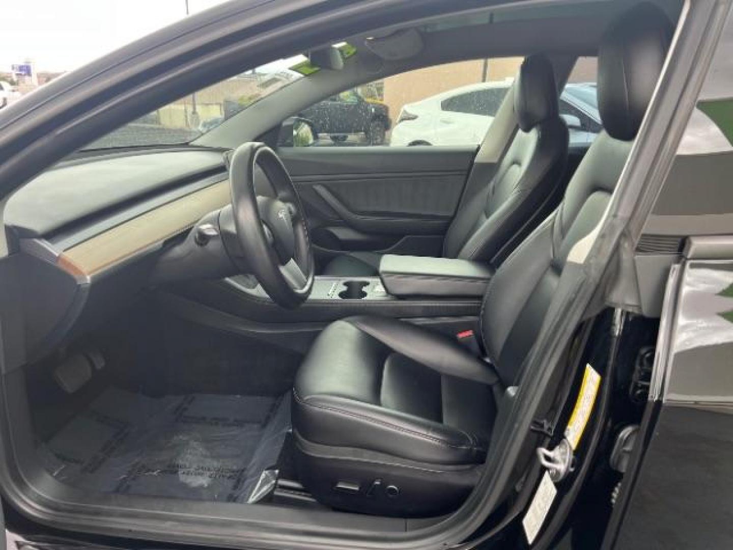 2021 Solid Black /Black Tesla Model 3 Long Range Dual Motor All-Wheel Drive (5YJ3E1EB8MF) with an ELECTRIC engine, Continuously Variable Transmission transmission, located at 1865 East Red Hills Pkwy, St. George, 84770, (435) 628-0023, 37.120850, -113.543640 - ****Price includes $4k IRS EV REBATE**** We are setup with IRS to file the rebate directly and take credit off the price of car. Check with IRS EV website to be sure you qualify. Trump has threatened to end rebate so ACT FAST! Full battery and motor warranty up to 120k miles 92 % Battery Health. - Photo#16