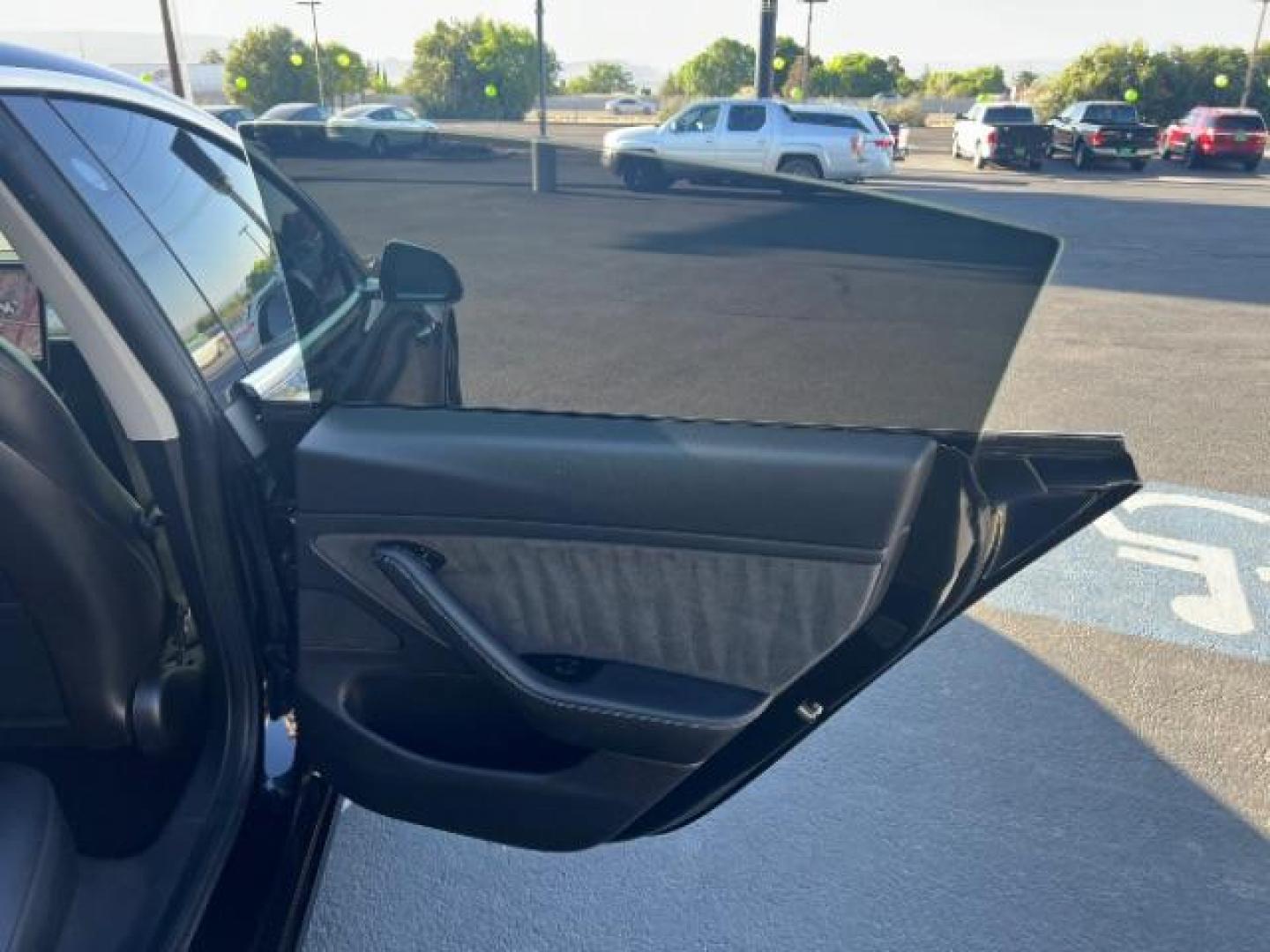 2020 Solid Black /Black Tesla Model 3 Long Range Dual Motor All-Wheel Drive (5YJ3E1EB1LF) with an ELECTRIC engine, 1 Speed Automatic transmission, located at 940 North Main Street, Cedar City, UT, 84720, (435) 628-0023, 37.692936, -113.061897 - ****Price includes $4k IRS EV REBATE**** We are setup with IRS to file the rebate directly and take credit off the price of car. Check with IRS EV website to be sure you qualify. Congress has threatened to end rebate so ACT FAST! 95% Battery Life. Gets 270 miles on full charge. Full battery and - Photo#24