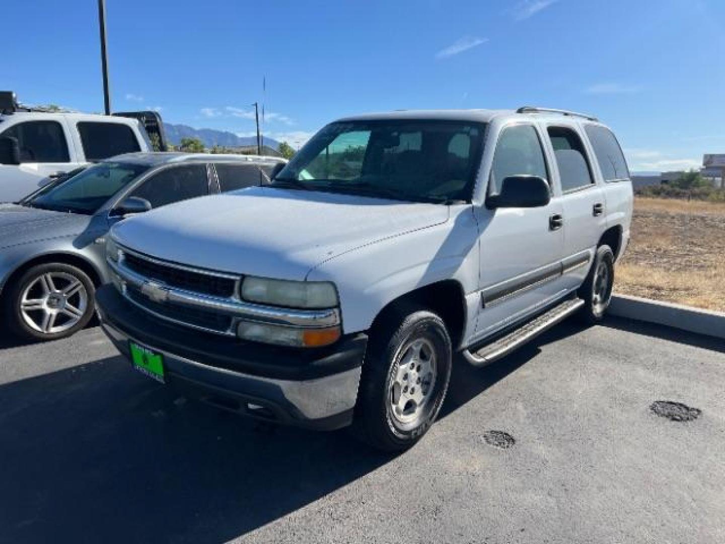 2004 Summit White /Tan/Neutral Chevrolet Tahoe LS (1GNEC13V44R) with an Vortec 4.8L V-8 regular unleaded engine, Automatic transmission, located at 1865 East Red Hills Pkwy, St. George, 84770, (435) 628-0023, 37.120850, -113.543640 - This vehicle is a Mechanic Special. This means it will need some love. Runs a drives fine but has body damage, leaks or other mechanical issues. It did NOT pass our 50 point inspection. Get a great deal on a less than perfect car. These cars do NOT qualify for our in house financing. Cash and carry, - Photo#2