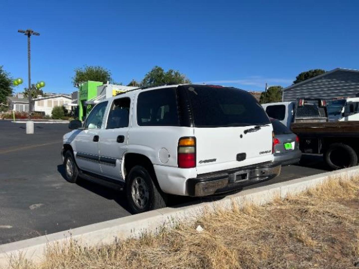 2004 Summit White /Tan/Neutral Chevrolet Tahoe LS (1GNEC13V44R) with an Vortec 4.8L V-8 regular unleaded engine, Automatic transmission, located at 1865 East Red Hills Pkwy, St. George, 84770, (435) 628-0023, 37.120850, -113.543640 - This vehicle is a Mechanic Special. This means it will need some love. Runs a drives fine but has body damage, leaks or other mechanical issues. It did NOT pass our 50 point inspection. Get a great deal on a less than perfect car. These cars do NOT qualify for our in house financing. Cash and carry, - Photo#4