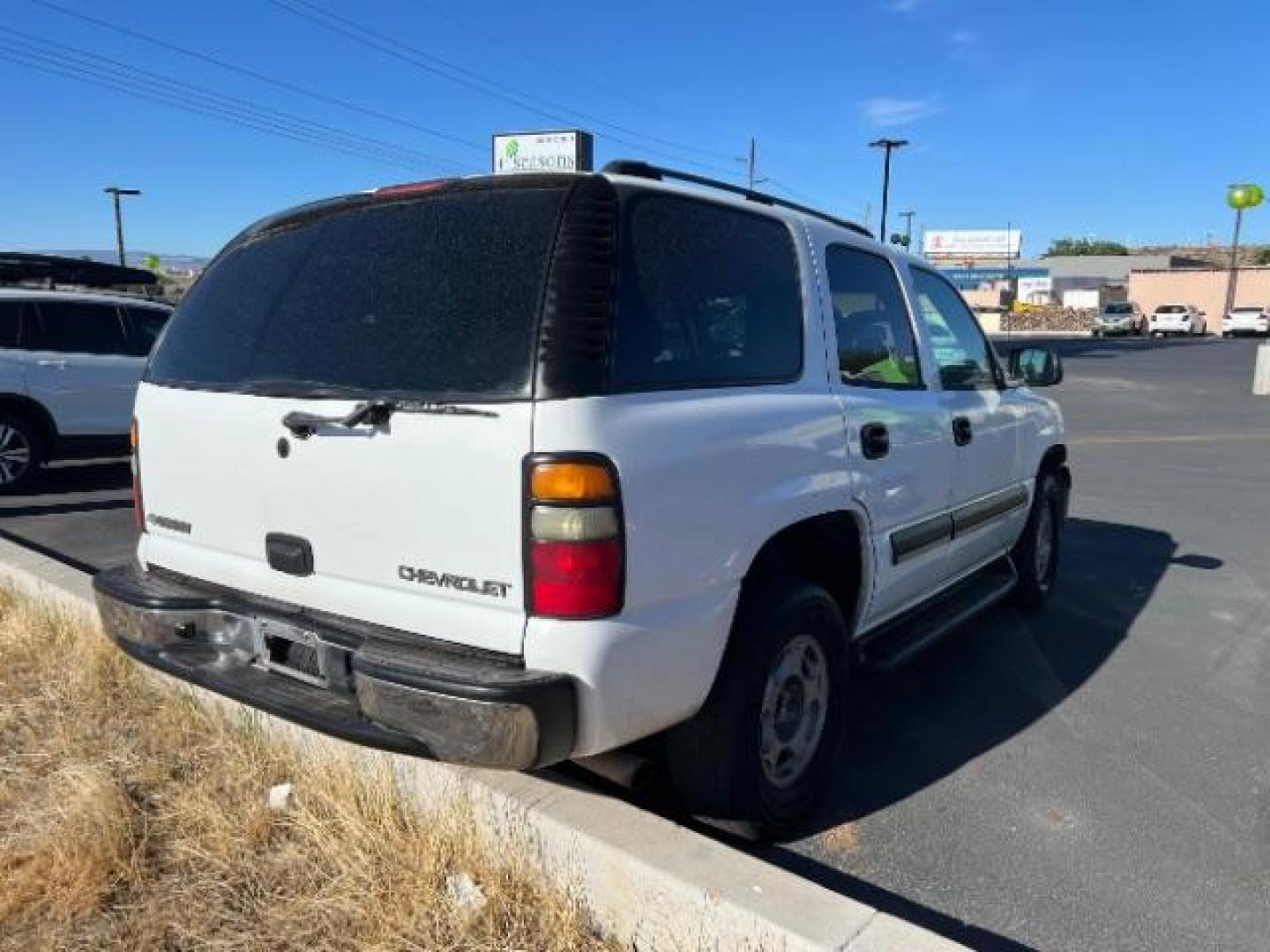 2004 Summit White /Tan/Neutral Chevrolet Tahoe LS (1GNEC13V44R) with an Vortec 4.8L V-8 regular unleaded engine, Automatic transmission, located at 1865 East Red Hills Pkwy, St. George, 84770, (435) 628-0023, 37.120850, -113.543640 - This vehicle is a Mechanic Special. This means it will need some love. Runs a drives fine but has body damage, leaks or other mechanical issues. It did NOT pass our 50 point inspection. Get a great deal on a less than perfect car. These cars do NOT qualify for our in house financing. Cash and carry, - Photo#6