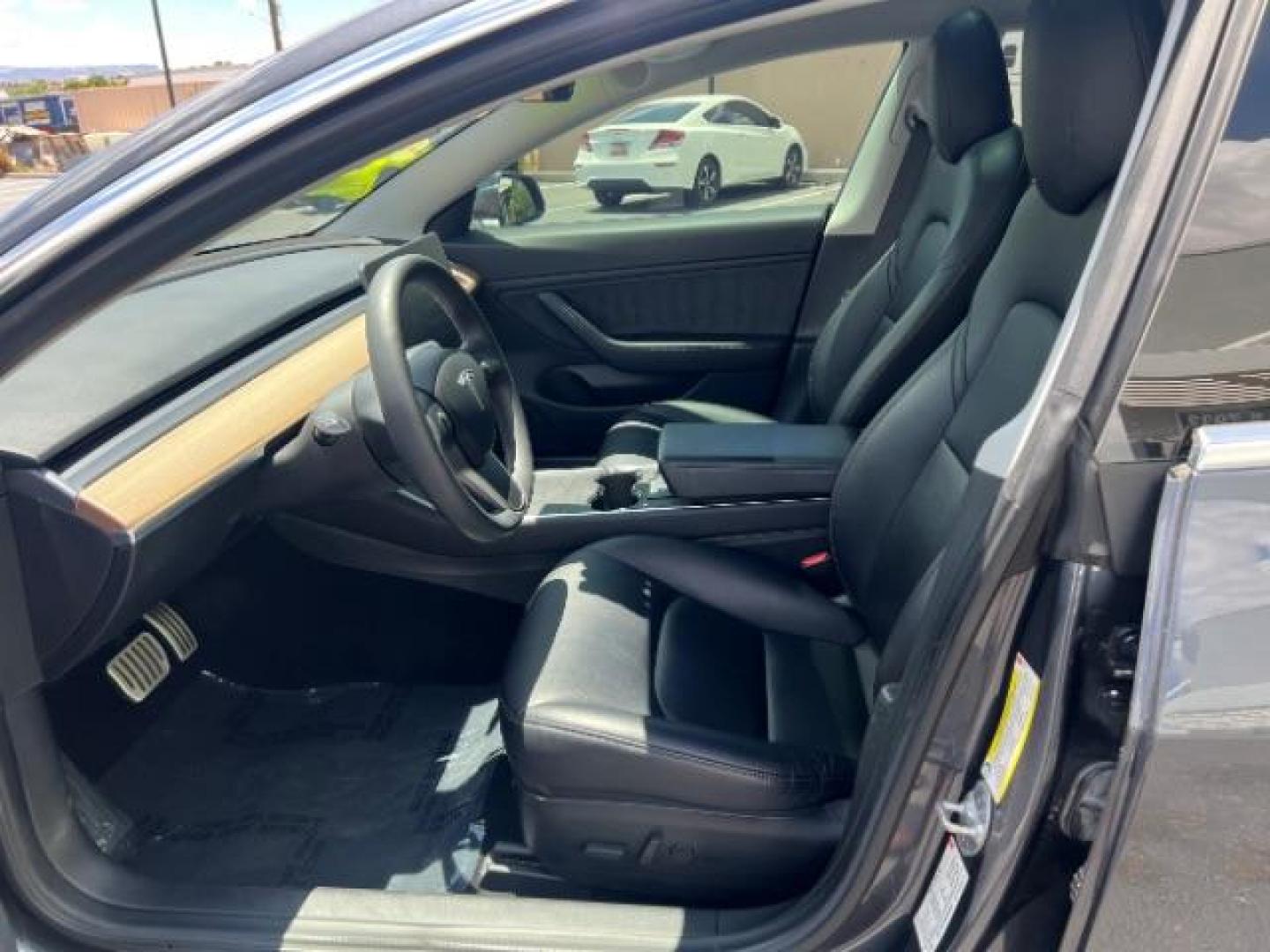 2018 Midnight Silver Metallic /Black Tesla Model 3 Long Range | Performance (5YJ3E1EB9JF) with an ELECTRIC engine, Continuously Variable Transmission transmission, located at 1865 East Red Hills Pkwy, St. George, 84770, (435) 628-0023, 37.120850, -113.543640 - ****Price includes $4k IRS EV REBATE**** We are setup with IRS to file the rebate directly and take credit off the price of car. Check with IRS EV website to be sure you qualify. Trump has threatened to end rebate so ACT FAST! Full battery and motor warranty up to 120k miles We are THE southern - Photo#16