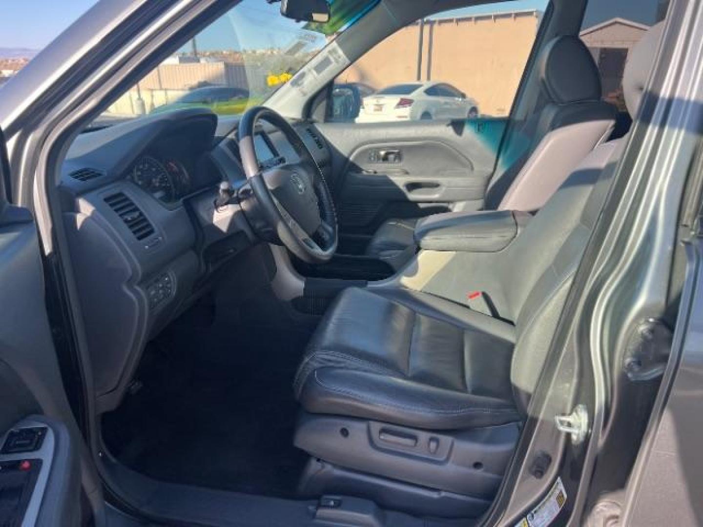 2007 Nimbus Gray Metallic /Gray Honda Pilot EX-L (5FNYF287X7B) with an 3.5L V-6 i-VTEC VCM variable valve control engine, Automatic transmission, located at 1865 East Red Hills Pkwy, St. George, 84770, (435) 628-0023, 37.120850, -113.543640 - We specialize in helping ALL people get the best financing available. No matter your credit score, good, bad or none we can get you an amazing rate. Had a bankruptcy, divorce, or repossessions? We give you the green light to get your credit back on the road. Low down and affordable payments that fit - Photo#14