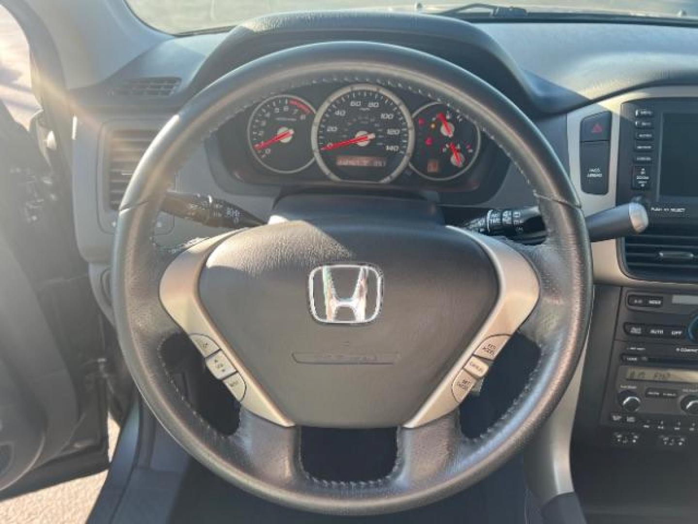 2007 Nimbus Gray Metallic /Gray Honda Pilot EX-L (5FNYF287X7B) with an 3.5L V-6 i-VTEC VCM variable valve control engine, Automatic transmission, located at 1865 East Red Hills Pkwy, St. George, 84770, (435) 628-0023, 37.120850, -113.543640 - We specialize in helping ALL people get the best financing available. No matter your credit score, good, bad or none we can get you an amazing rate. Had a bankruptcy, divorce, or repossessions? We give you the green light to get your credit back on the road. Low down and affordable payments that fit - Photo#16