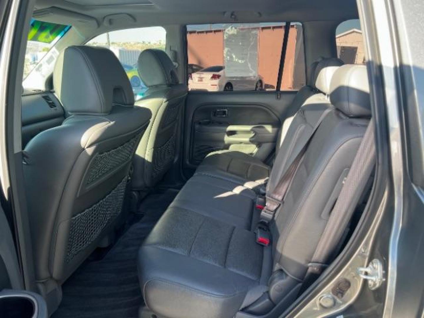 2007 Nimbus Gray Metallic /Gray Honda Pilot EX-L (5FNYF287X7B) with an 3.5L V-6 i-VTEC VCM variable valve control engine, Automatic transmission, located at 1865 East Red Hills Pkwy, St. George, 84770, (435) 628-0023, 37.120850, -113.543640 - We specialize in helping ALL people get the best financing available. No matter your credit score, good, bad or none we can get you an amazing rate. Had a bankruptcy, divorce, or repossessions? We give you the green light to get your credit back on the road. Low down and affordable payments that fit - Photo#22