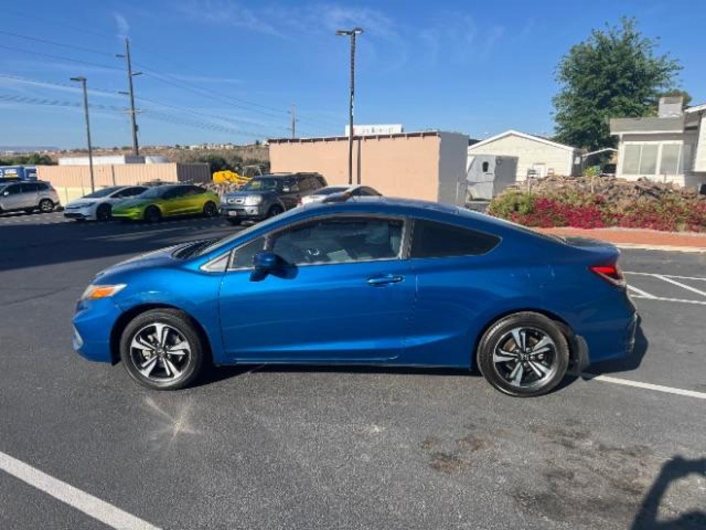 2014 Dyno Blue Pearl /Black Honda Civic EX (2HGFG3B84EH) with an 1.8L I-4 i-VTEC variable valve control engine, Automatic transmission, located at 940 North Main Street, Cedar City, UT, 84720, (435) 628-0023, 37.692936, -113.061897 - We specialize in helping ALL people get the best financing available. No matter your credit score, good, bad or none we can get you an amazing rate. Had a bankruptcy, divorce, or repossessions? We give you the green light to get your credit back on the road. Low down and affordable payments that fit - Photo#3