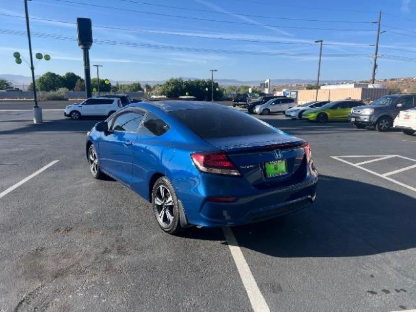 2014 Dyno Blue Pearl /Black Honda Civic EX (2HGFG3B84EH) with an 1.8L I-4 i-VTEC variable valve control engine, Automatic transmission, located at 940 North Main Street, Cedar City, UT, 84720, (435) 628-0023, 37.692936, -113.061897 - We specialize in helping ALL people get the best financing available. No matter your credit score, good, bad or none we can get you an amazing rate. Had a bankruptcy, divorce, or repossessions? We give you the green light to get your credit back on the road. Low down and affordable payments that fit - Photo#4