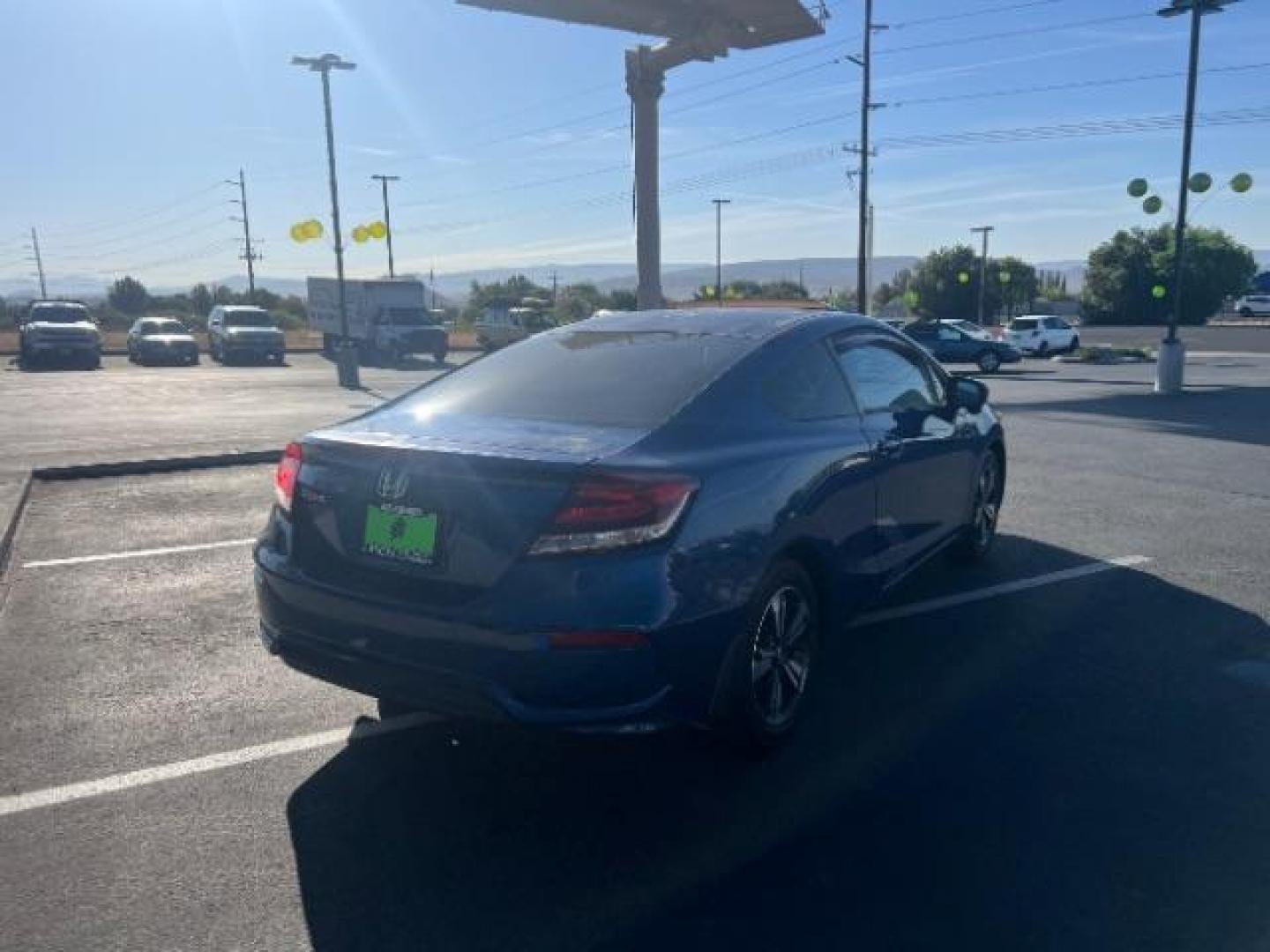 2014 Dyno Blue Pearl /Black Honda Civic EX (2HGFG3B84EH) with an 1.8L I-4 i-VTEC variable valve control engine, Automatic transmission, located at 940 North Main Street, Cedar City, UT, 84720, (435) 628-0023, 37.692936, -113.061897 - We specialize in helping ALL people get the best financing available. No matter your credit score, good, bad or none we can get you an amazing rate. Had a bankruptcy, divorce, or repossessions? We give you the green light to get your credit back on the road. Low down and affordable payments that fit - Photo#6