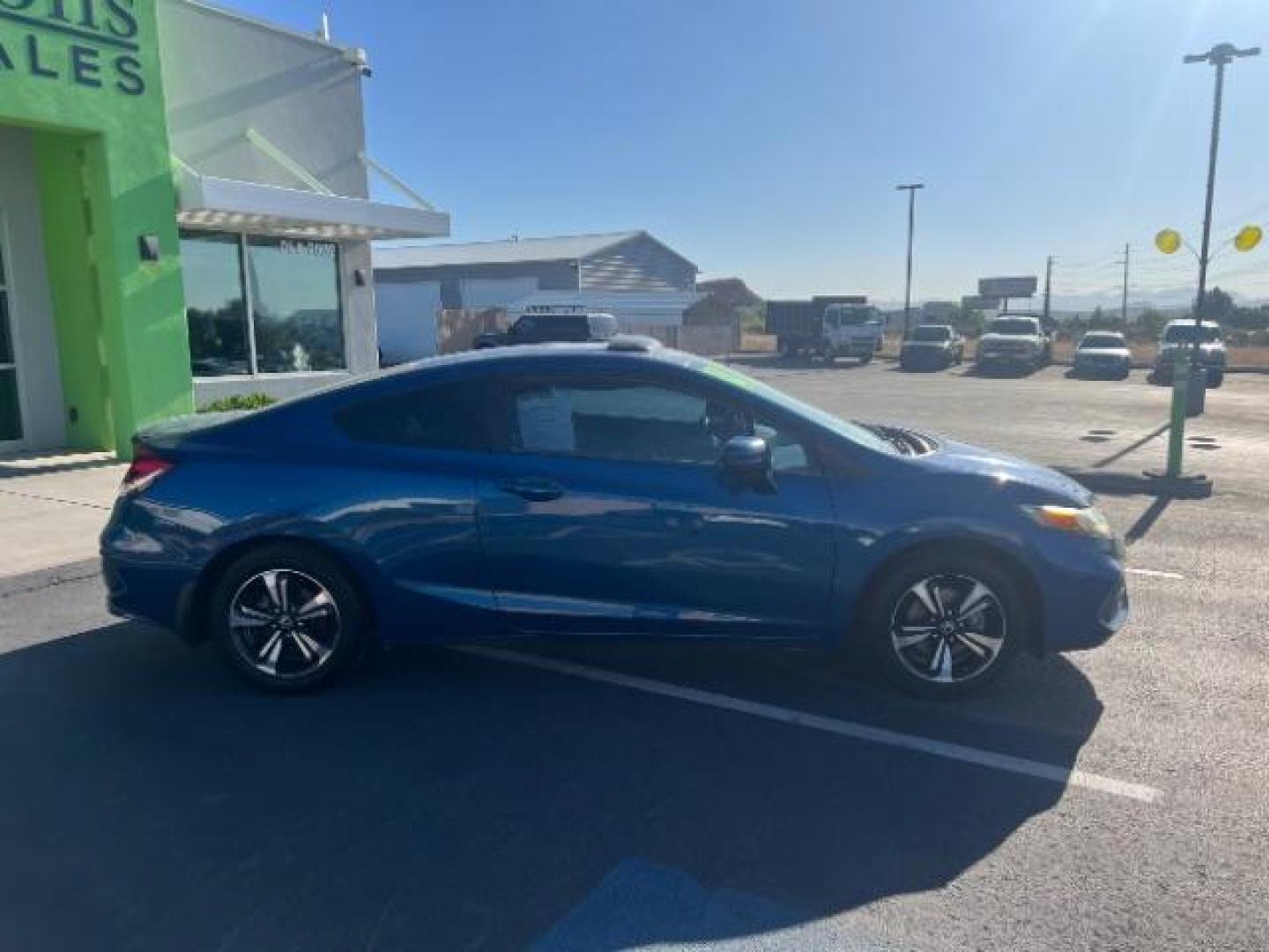 2014 Dyno Blue Pearl /Black Honda Civic EX (2HGFG3B84EH) with an 1.8L I-4 i-VTEC variable valve control engine, Automatic transmission, located at 940 North Main Street, Cedar City, UT, 84720, (435) 628-0023, 37.692936, -113.061897 - We specialize in helping ALL people get the best financing available. No matter your credit score, good, bad or none we can get you an amazing rate. Had a bankruptcy, divorce, or repossessions? We give you the green light to get your credit back on the road. Low down and affordable payments that fit - Photo#7