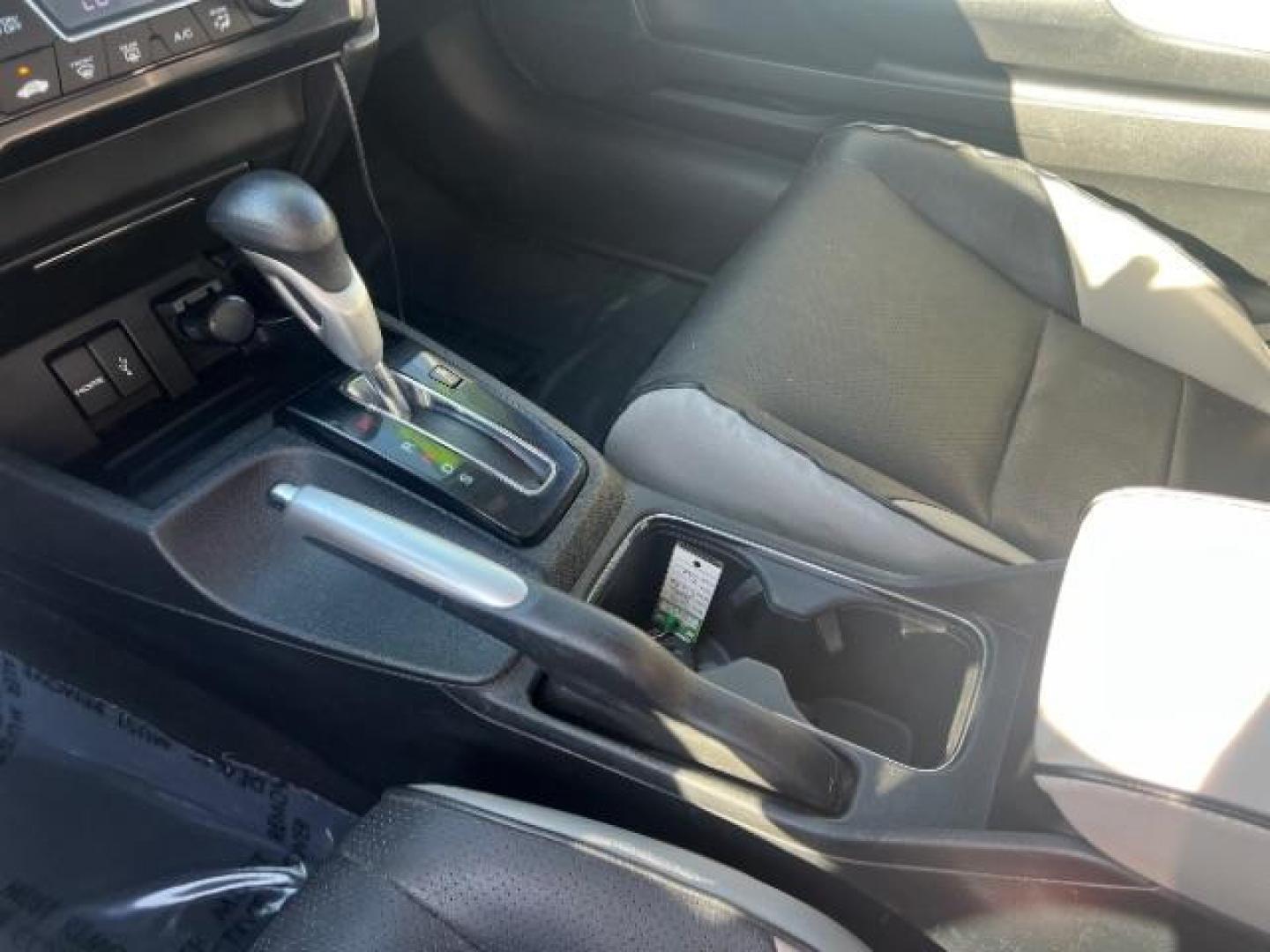 2014 Dyno Blue Pearl /Black Honda Civic EX (2HGFG3B84EH) with an 1.8L I-4 i-VTEC variable valve control engine, Automatic transmission, located at 940 North Main Street, Cedar City, UT, 84720, (435) 628-0023, 37.692936, -113.061897 - We specialize in helping ALL people get the best financing available. No matter your credit score, good, bad or none we can get you an amazing rate. Had a bankruptcy, divorce, or repossessions? We give you the green light to get your credit back on the road. Low down and affordable payments that fit - Photo#18