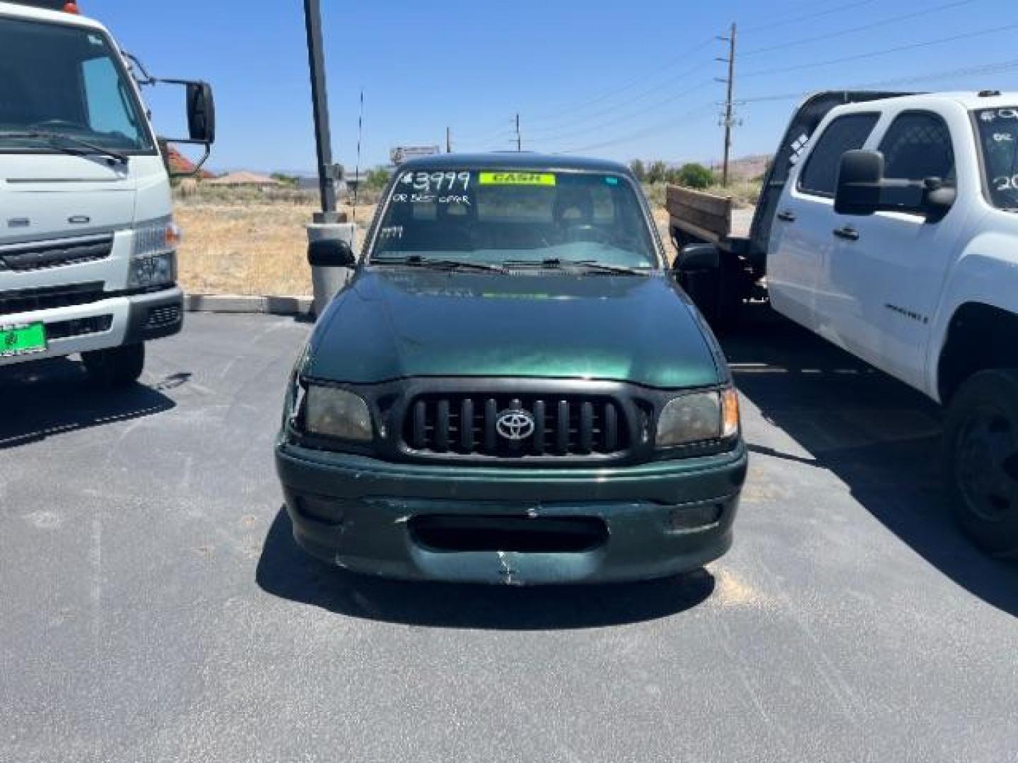 1999 Green /GRAY Toyota Tacoma PICK UP (4TANL42N8XZ) with an 4 CYL engine, AUTOMATIC transmission, located at 1865 East Red Hills Pkwy, St. George, 84770, (435) 628-0023, 37.120850, -113.543640 - This vehicle is a Mechanic Special. This means it will need some love. Runs a drives fine but has body damage, leaks or other mechanical issues. It did NOT pass our 50 point inspection. Get a great deal on a less than perfect car. These cars do NOT qualify for our in house financing. Cash and carry, - Photo#1
