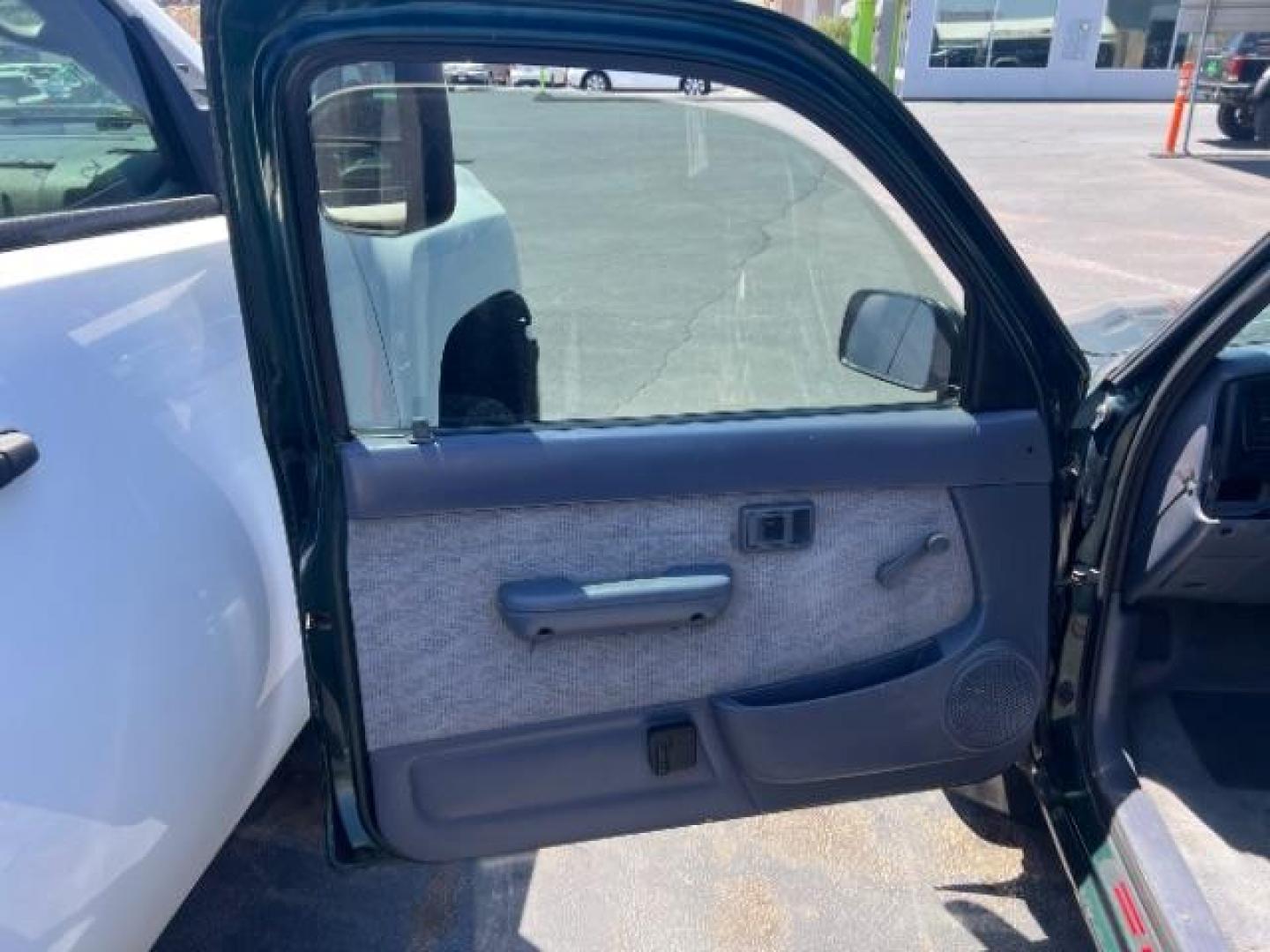1999 Green /GRAY Toyota Tacoma PICK UP (4TANL42N8XZ) with an 4 CYL engine, AUTOMATIC transmission, located at 1865 East Red Hills Pkwy, St. George, 84770, (435) 628-0023, 37.120850, -113.543640 - This vehicle is a Mechanic Special. This means it will need some love. Runs a drives fine but has body damage, leaks or other mechanical issues. It did NOT pass our 50 point inspection. Get a great deal on a less than perfect car. These cars do NOT qualify for our in house financing. Cash and carry, - Photo#7