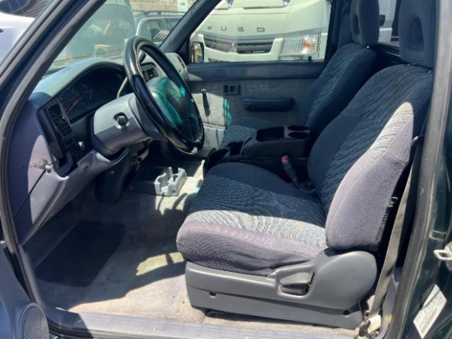 1999 Green /GRAY Toyota Tacoma PICK UP (4TANL42N8XZ) with an 4 CYL engine, AUTOMATIC transmission, located at 1865 East Red Hills Pkwy, St. George, 84770, (435) 628-0023, 37.120850, -113.543640 - This vehicle is a Mechanic Special. This means it will need some love. Runs a drives fine but has body damage, leaks or other mechanical issues. It did NOT pass our 50 point inspection. Get a great deal on a less than perfect car. These cars do NOT qualify for our in house financing. Cash and carry, - Photo#8
