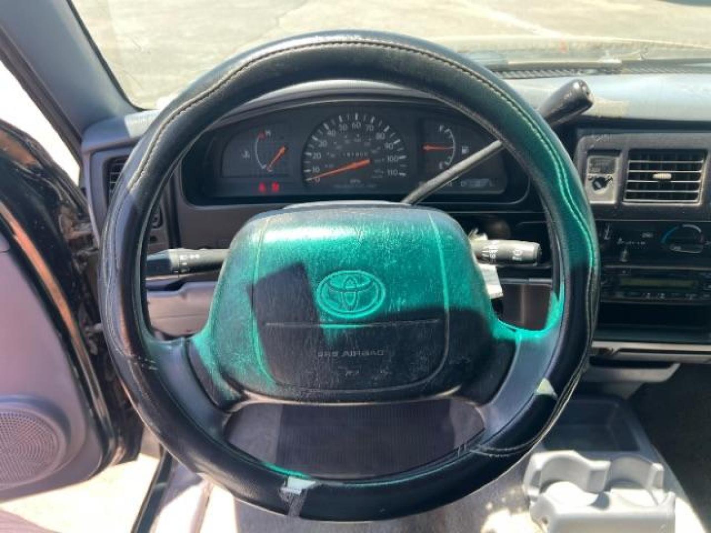 1999 Green /GRAY Toyota Tacoma PICK UP (4TANL42N8XZ) with an 4 CYL engine, AUTOMATIC transmission, located at 1865 East Red Hills Pkwy, St. George, 84770, (435) 628-0023, 37.120850, -113.543640 - This vehicle is a Mechanic Special. This means it will need some love. Runs a drives fine but has body damage, leaks or other mechanical issues. It did NOT pass our 50 point inspection. Get a great deal on a less than perfect car. These cars do NOT qualify for our in house financing. Cash and carry, - Photo#9