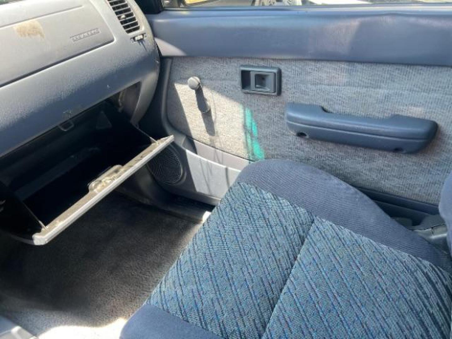 1999 Green /GRAY Toyota Tacoma PICK UP (4TANL42N8XZ) with an 4 CYL engine, AUTOMATIC transmission, located at 1865 East Red Hills Pkwy, St. George, 84770, (435) 628-0023, 37.120850, -113.543640 - This vehicle is a Mechanic Special. This means it will need some love. Runs a drives fine but has body damage, leaks or other mechanical issues. It did NOT pass our 50 point inspection. Get a great deal on a less than perfect car. These cars do NOT qualify for our in house financing. Cash and carry, - Photo#13