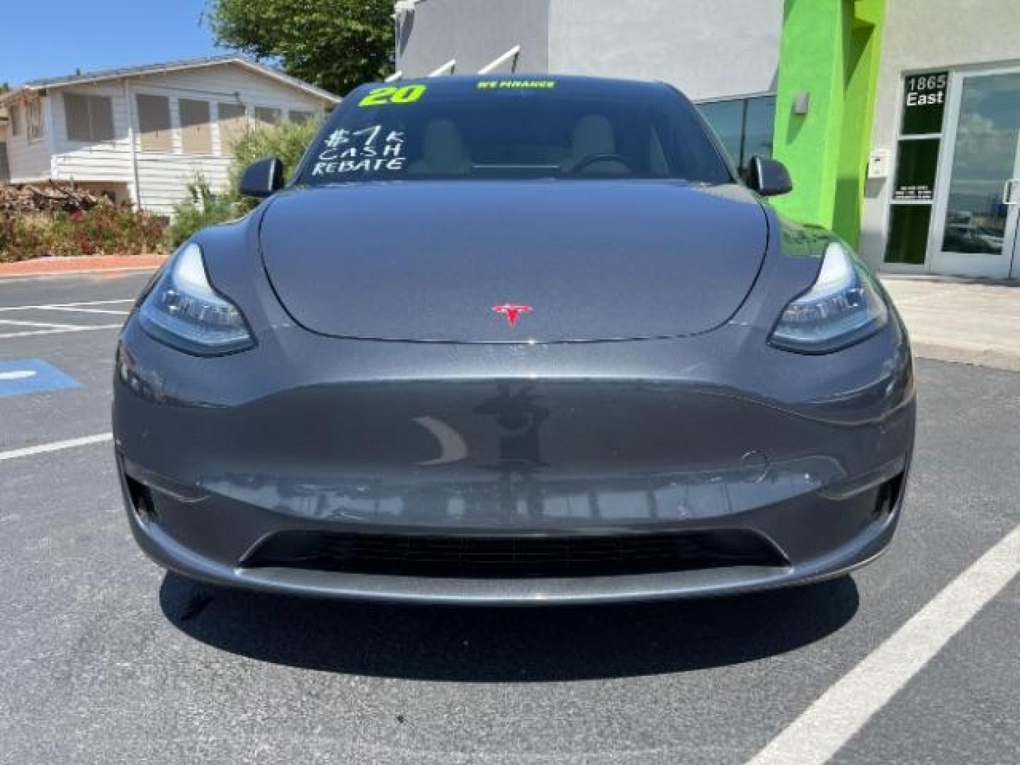 2020 Grey /White Tesla Model Y Performance Dual Motor All-Wheel Drive (5YJYGDEF3LF) with an ELECTRIC engine, Continuously Variable Transmission transmission, located at 1865 East Red Hills Pkwy, St. George, 84770, (435) 628-0023, 37.120850, -113.543640 - ****Price includes $4k IRS EV REBATE**** We are setup with IRS to file the rebate directly and take credit off the price of car. Check with IRS EV website to be sure you qualify. Congress has threatened to end rebate so ACT FAST! 85% Battery Life. Gets 260 miles on full charge. Full battery and - Photo#1
