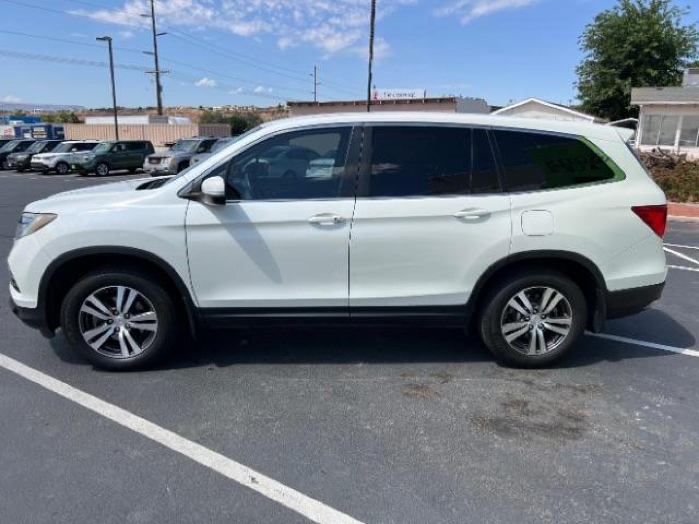 2017 White Diamond Pearl /Black Honda Pilot EX (5FNYF5H3XHB) with an 3.5L V-6 gasoline direct injection engine, Automatic transmission, located at 1865 East Red Hills Pkwy, St. George, 84770, (435) 628-0023, 37.120850, -113.543640 - We specialize in helping ALL people get the best financing available. No matter your credit score, good, bad or none we can get you an amazing rate. Had a bankruptcy, divorce, or repossessions? We give you the green light to get your credit back on the road. Low down and affordable payments that fit - Photo#5