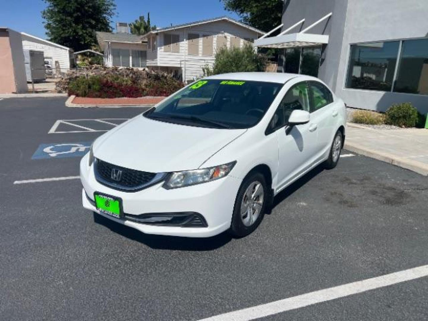 2013 Taffeta White /Beige Honda Civic LX (19XFB2F56DE) with an 1.8L I-4 i-VTEC variable valve control engine, Automatic transmission, located at 1865 East Red Hills Pkwy, St. George, 84770, (435) 628-0023, 37.120850, -113.543640 - We specialize in helping ALL people get the best financing available. No matter your credit score, good, bad or none we can get you an amazing rate. Had a bankruptcy, divorce, or repossessions? We give you the green light to get your credit back on the road. Low down and affordable payments that fit - Photo#2