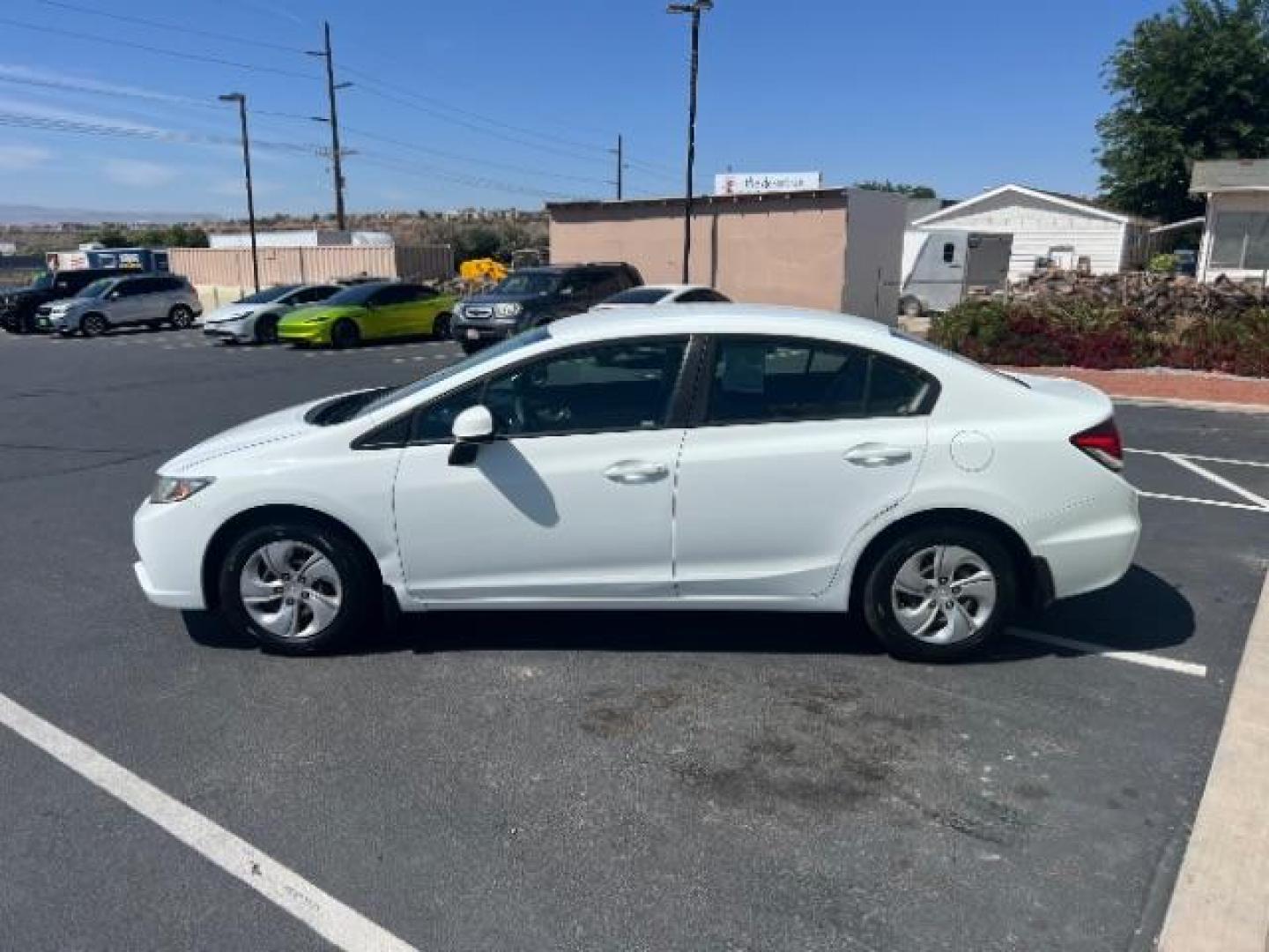 2013 Taffeta White /Beige Honda Civic LX (19XFB2F56DE) with an 1.8L I-4 i-VTEC variable valve control engine, Automatic transmission, located at 1865 East Red Hills Pkwy, St. George, 84770, (435) 628-0023, 37.120850, -113.543640 - We specialize in helping ALL people get the best financing available. No matter your credit score, good, bad or none we can get you an amazing rate. Had a bankruptcy, divorce, or repossessions? We give you the green light to get your credit back on the road. Low down and affordable payments that fit - Photo#3