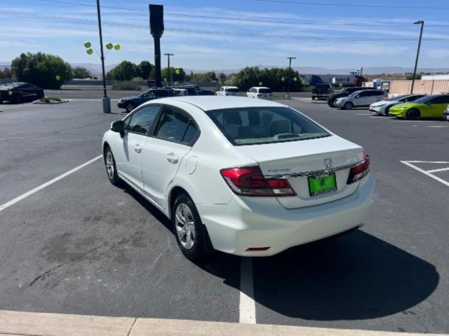2013 Taffeta White /Beige Honda Civic LX (19XFB2F56DE) with an 1.8L I-4 i-VTEC variable valve control engine, Automatic transmission, located at 1865 East Red Hills Pkwy, St. George, 84770, (435) 628-0023, 37.120850, -113.543640 - We specialize in helping ALL people get the best financing available. No matter your credit score, good, bad or none we can get you an amazing rate. Had a bankruptcy, divorce, or repossessions? We give you the green light to get your credit back on the road. Low down and affordable payments that fit - Photo#4