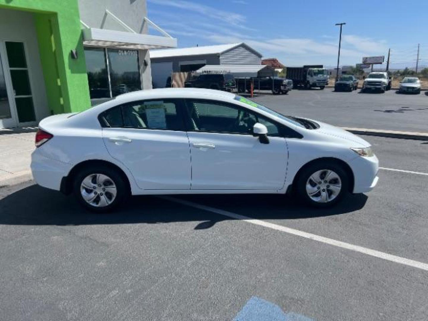 2013 Taffeta White /Beige Honda Civic LX (19XFB2F56DE) with an 1.8L I-4 i-VTEC variable valve control engine, Automatic transmission, located at 1865 East Red Hills Pkwy, St. George, 84770, (435) 628-0023, 37.120850, -113.543640 - We specialize in helping ALL people get the best financing available. No matter your credit score, good, bad or none we can get you an amazing rate. Had a bankruptcy, divorce, or repossessions? We give you the green light to get your credit back on the road. Low down and affordable payments that fit - Photo#7