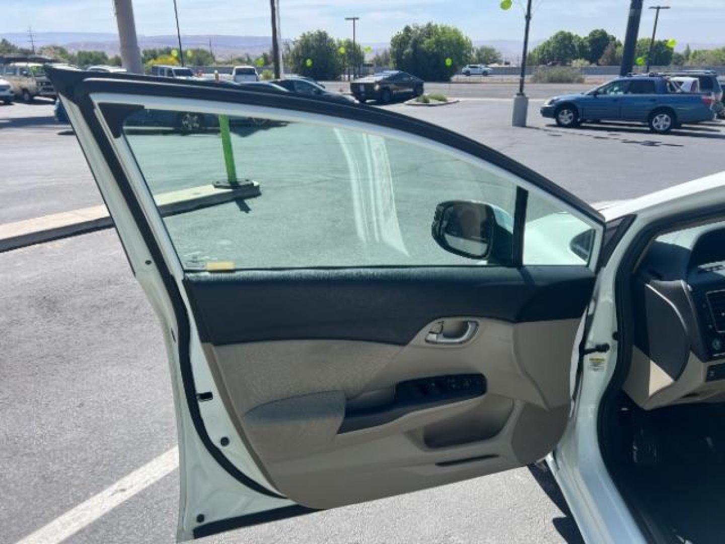2013 Taffeta White /Beige Honda Civic LX (19XFB2F56DE) with an 1.8L I-4 i-VTEC variable valve control engine, Automatic transmission, located at 1865 East Red Hills Pkwy, St. George, 84770, (435) 628-0023, 37.120850, -113.543640 - We specialize in helping ALL people get the best financing available. No matter your credit score, good, bad or none we can get you an amazing rate. Had a bankruptcy, divorce, or repossessions? We give you the green light to get your credit back on the road. Low down and affordable payments that fit - Photo#12