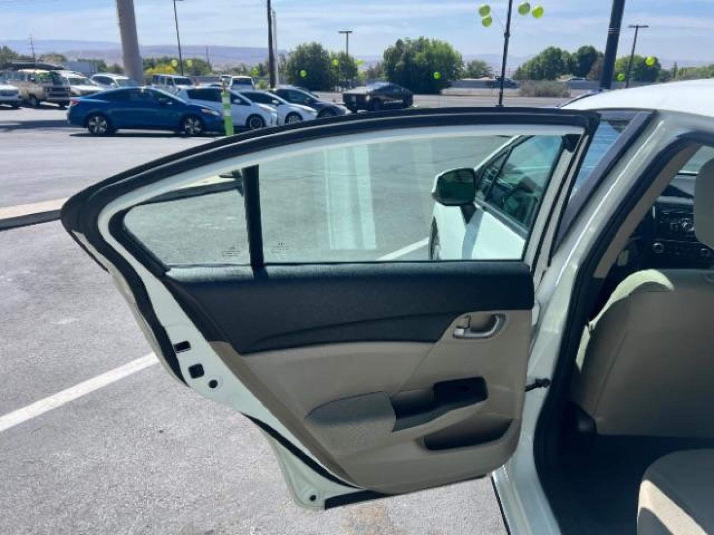 2013 Taffeta White /Beige Honda Civic LX (19XFB2F56DE) with an 1.8L I-4 i-VTEC variable valve control engine, Automatic transmission, located at 1865 East Red Hills Pkwy, St. George, 84770, (435) 628-0023, 37.120850, -113.543640 - We specialize in helping ALL people get the best financing available. No matter your credit score, good, bad or none we can get you an amazing rate. Had a bankruptcy, divorce, or repossessions? We give you the green light to get your credit back on the road. Low down and affordable payments that fit - Photo#21