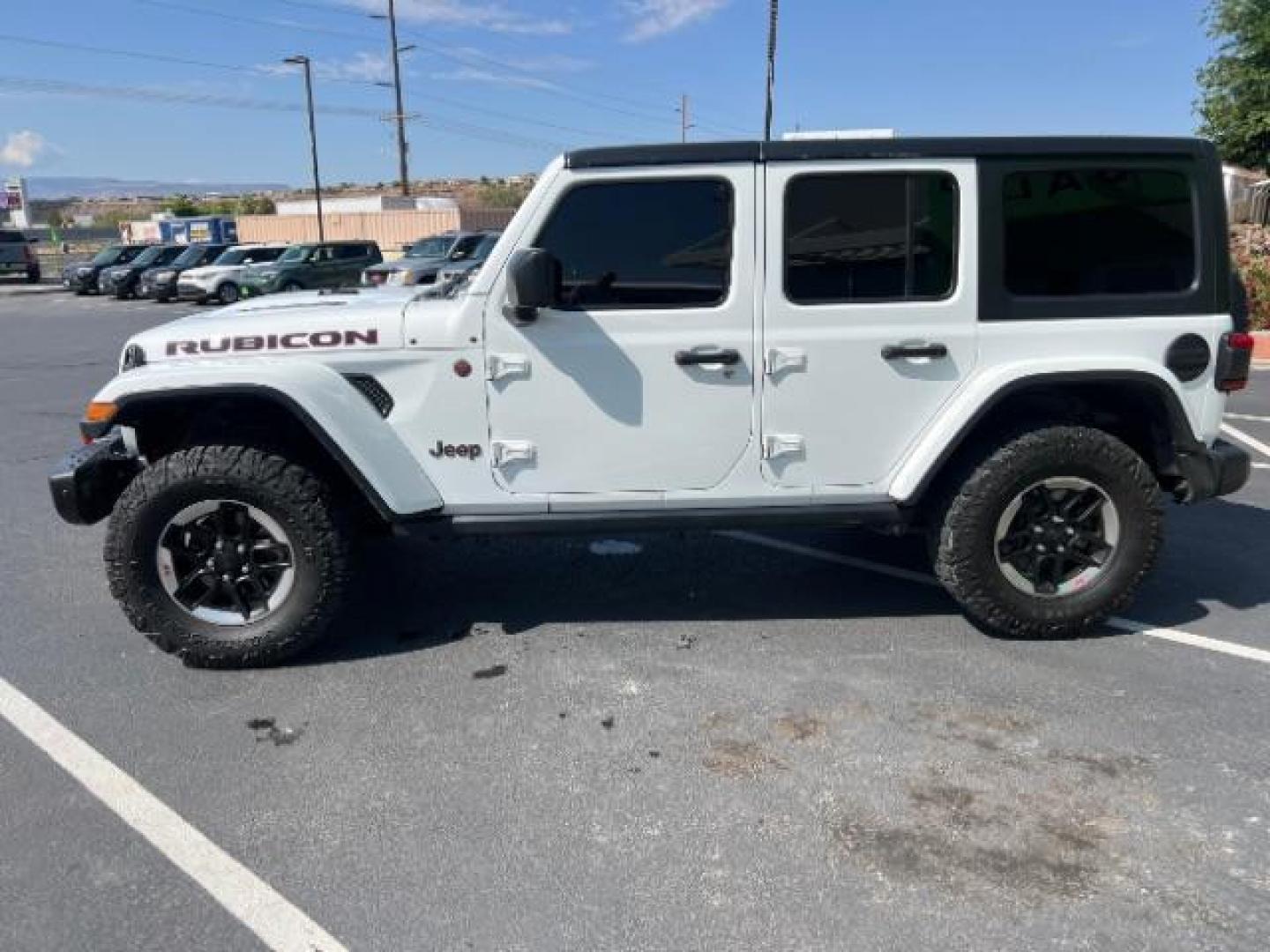 2018 Bright White Clearcoat /Black/Heritage Tan Jeep Wrangler Unlimited Rubicon 4x4 (1C4HJXFG6JW) with an Pentastar 3.6L V-6 DOHC engine, Automatic transmission, located at 940 North Main Street, Cedar City, UT, 84720, (435) 628-0023, 37.692936, -113.061897 - We specialize in helping ALL people get the best financing available. No matter your credit score, good, bad or none we can get you an amazing rate. Had a bankruptcy, divorce, or repossessions? We give you the green light to get your credit back on the road. Low down and affordable payments that fit - Photo#3