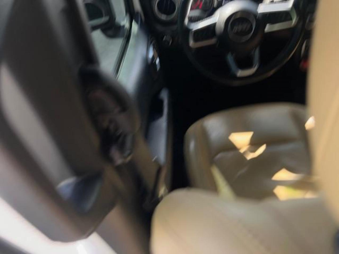 2018 Bright White Clearcoat /Black/Heritage Tan Jeep Wrangler Unlimited Rubicon 4x4 (1C4HJXFG6JW) with an Pentastar 3.6L V-6 DOHC engine, Automatic transmission, located at 940 North Main Street, Cedar City, UT, 84720, (435) 628-0023, 37.692936, -113.061897 - We specialize in helping ALL people get the best financing available. No matter your credit score, good, bad or none we can get you an amazing rate. Had a bankruptcy, divorce, or repossessions? We give you the green light to get your credit back on the road. Low down and affordable payments that fit - Photo#17