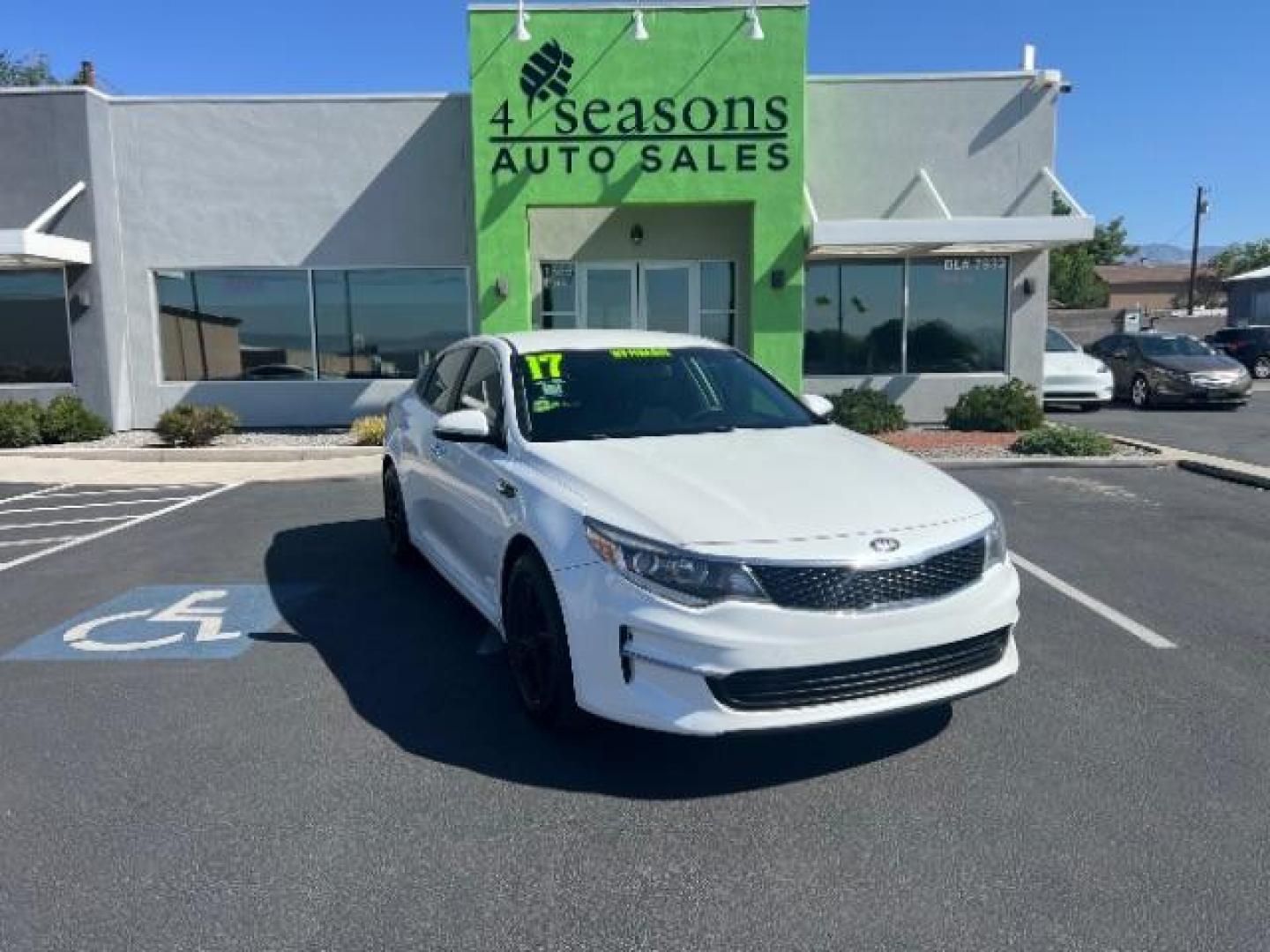 2017 Snow White Pearl /Black Cloth, cloth Kia Optima LX (KNAGT4L35H5) with an 2.4L L4 DOHC 16V engine, 6-Speed Automatic transmission, located at 1865 East Red Hills Pkwy, St. George, 84770, (435) 628-0023, 37.120850, -113.543640 - We specialize in helping ALL people get the best financing available. No matter your credit score, good, bad or none we can get you an amazing rate. Had a bankruptcy, divorce, or repossessions? We give you the green light to get your credit back on the road. Low down and affordable payments that fit - Photo#0