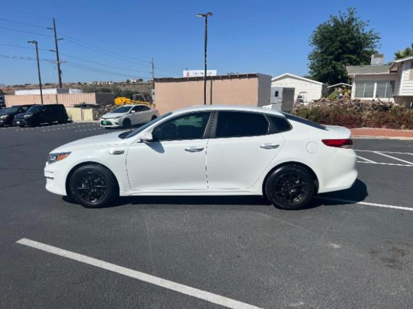 2017 Snow White Pearl /Black Cloth, cloth Kia Optima LX (KNAGT4L35H5) with an 2.4L L4 DOHC 16V engine, 6-Speed Automatic transmission, located at 1865 East Red Hills Pkwy, St. George, 84770, (435) 628-0023, 37.120850, -113.543640 - We specialize in helping ALL people get the best financing available. No matter your credit score, good, bad or none we can get you an amazing rate. Had a bankruptcy, divorce, or repossessions? We give you the green light to get your credit back on the road. Low down and affordable payments that fit - Photo#3
