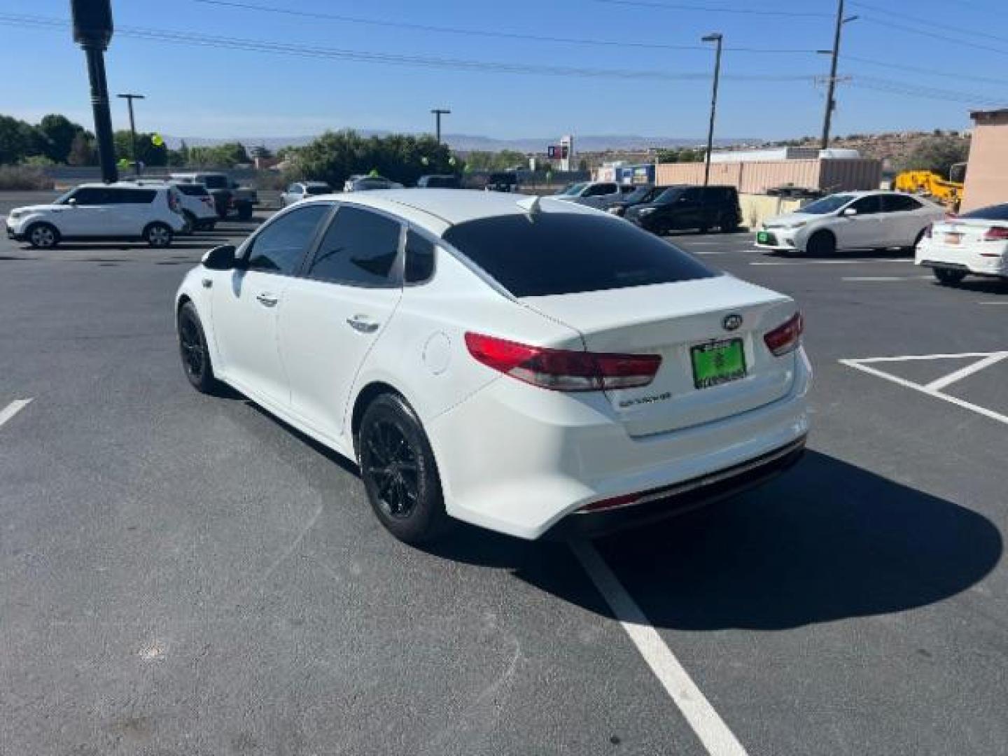 2017 Snow White Pearl /Black Cloth, cloth Kia Optima LX (KNAGT4L35H5) with an 2.4L L4 DOHC 16V engine, 6-Speed Automatic transmission, located at 1865 East Red Hills Pkwy, St. George, 84770, (435) 628-0023, 37.120850, -113.543640 - We specialize in helping ALL people get the best financing available. No matter your credit score, good, bad or none we can get you an amazing rate. Had a bankruptcy, divorce, or repossessions? We give you the green light to get your credit back on the road. Low down and affordable payments that fit - Photo#4