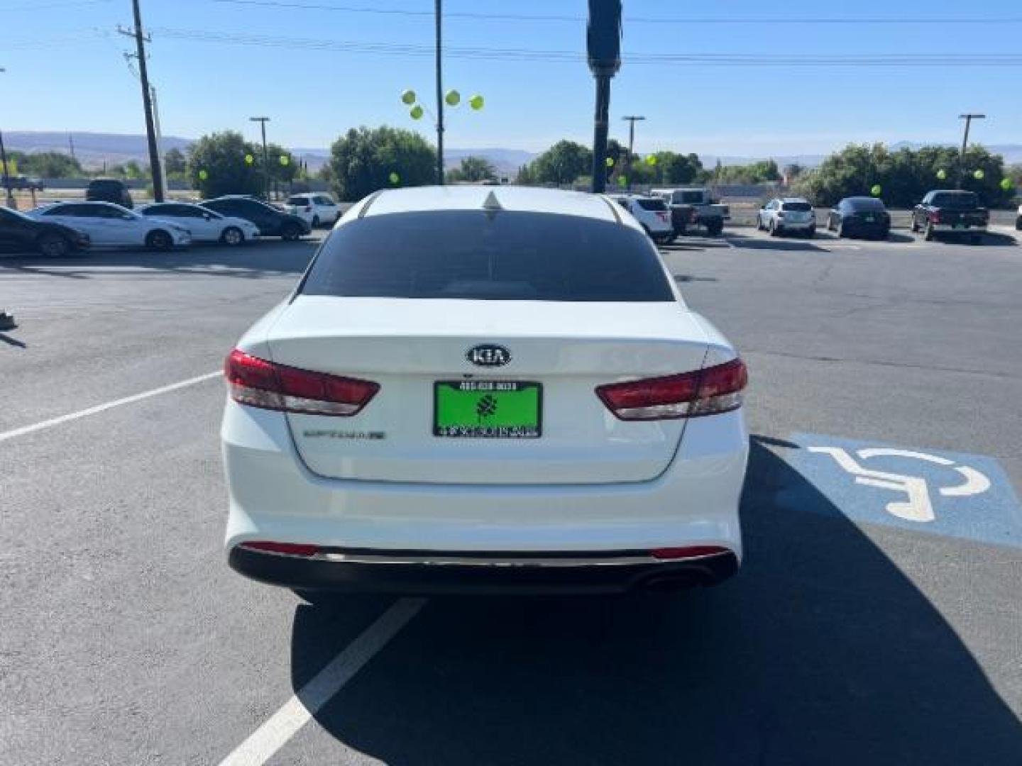 2017 Snow White Pearl /Black Cloth, cloth Kia Optima LX (KNAGT4L35H5) with an 2.4L L4 DOHC 16V engine, 6-Speed Automatic transmission, located at 1865 East Red Hills Pkwy, St. George, 84770, (435) 628-0023, 37.120850, -113.543640 - We specialize in helping ALL people get the best financing available. No matter your credit score, good, bad or none we can get you an amazing rate. Had a bankruptcy, divorce, or repossessions? We give you the green light to get your credit back on the road. Low down and affordable payments that fit - Photo#5