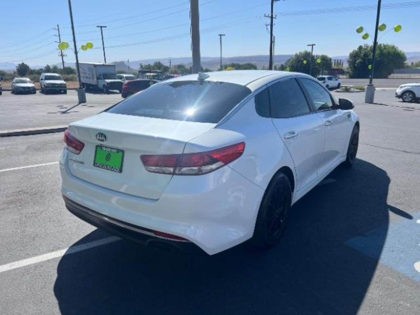 2017 Snow White Pearl /Black Cloth, cloth Kia Optima LX (KNAGT4L35H5) with an 2.4L L4 DOHC 16V engine, 6-Speed Automatic transmission, located at 1865 East Red Hills Pkwy, St. George, 84770, (435) 628-0023, 37.120850, -113.543640 - We specialize in helping ALL people get the best financing available. No matter your credit score, good, bad or none we can get you an amazing rate. Had a bankruptcy, divorce, or repossessions? We give you the green light to get your credit back on the road. Low down and affordable payments that fit - Photo#6