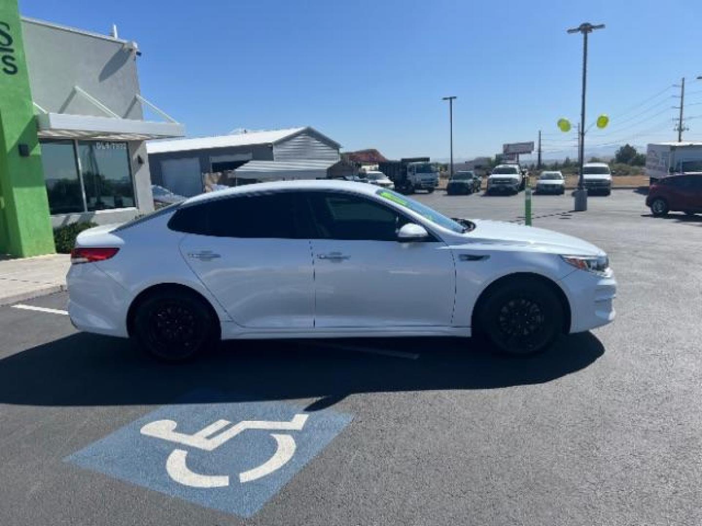 2017 Snow White Pearl /Black Cloth, cloth Kia Optima LX (KNAGT4L35H5) with an 2.4L L4 DOHC 16V engine, 6-Speed Automatic transmission, located at 1865 East Red Hills Pkwy, St. George, 84770, (435) 628-0023, 37.120850, -113.543640 - We specialize in helping ALL people get the best financing available. No matter your credit score, good, bad or none we can get you an amazing rate. Had a bankruptcy, divorce, or repossessions? We give you the green light to get your credit back on the road. Low down and affordable payments that fit - Photo#7