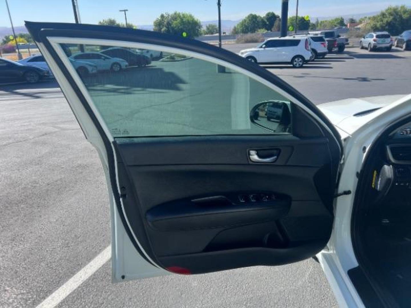 2017 Snow White Pearl /Black Cloth, cloth Kia Optima LX (KNAGT4L35H5) with an 2.4L L4 DOHC 16V engine, 6-Speed Automatic transmission, located at 1865 East Red Hills Pkwy, St. George, 84770, (435) 628-0023, 37.120850, -113.543640 - We specialize in helping ALL people get the best financing available. No matter your credit score, good, bad or none we can get you an amazing rate. Had a bankruptcy, divorce, or repossessions? We give you the green light to get your credit back on the road. Low down and affordable payments that fit - Photo#12