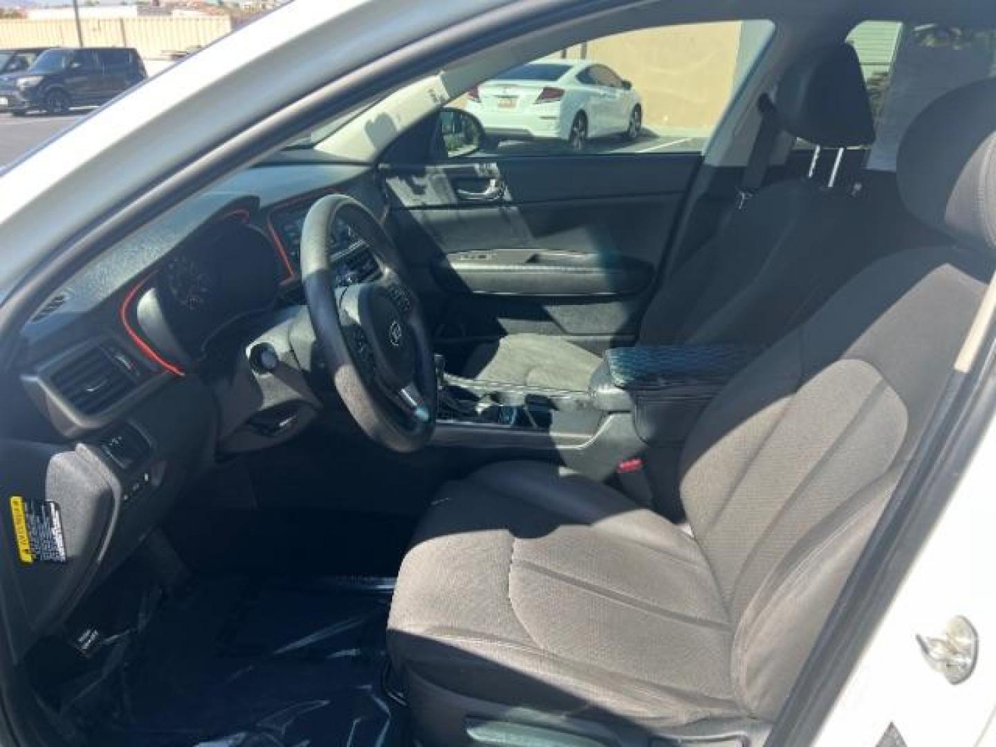 2017 Snow White Pearl /Black Cloth, cloth Kia Optima LX (KNAGT4L35H5) with an 2.4L L4 DOHC 16V engine, 6-Speed Automatic transmission, located at 1865 East Red Hills Pkwy, St. George, 84770, (435) 628-0023, 37.120850, -113.543640 - We specialize in helping ALL people get the best financing available. No matter your credit score, good, bad or none we can get you an amazing rate. Had a bankruptcy, divorce, or repossessions? We give you the green light to get your credit back on the road. Low down and affordable payments that fit - Photo#14