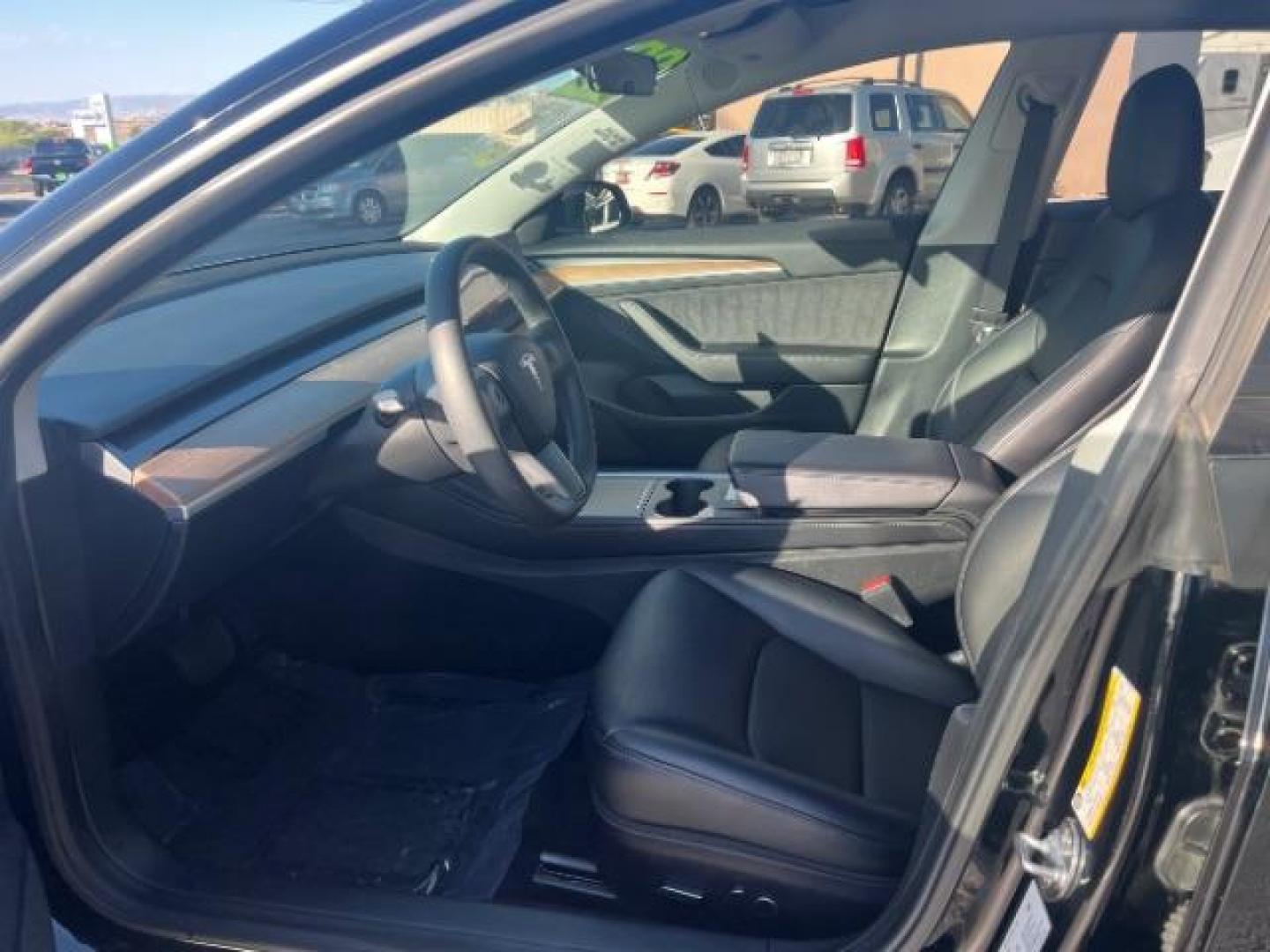2022 Solid Black /Black Tesla Model 3 Long Range Dual Motor All-Wheel Drive (5YJ3E1EBXNF) with an Electric engine, Electric transmission, located at 1865 East Red Hills Pkwy, St. George, 84770, (435) 628-0023, 37.120850, -113.543640 - ****Price includes $4k IRS EV REBATE**** We are setup with IRS to file the rebate directly and take credit off the price of car. Check with IRS EV website to be sure you qualify. Trump has threatened to end rebate so ACT FAST! Full battery and motor warranty up to 120k miles We are THE southern - Photo#16