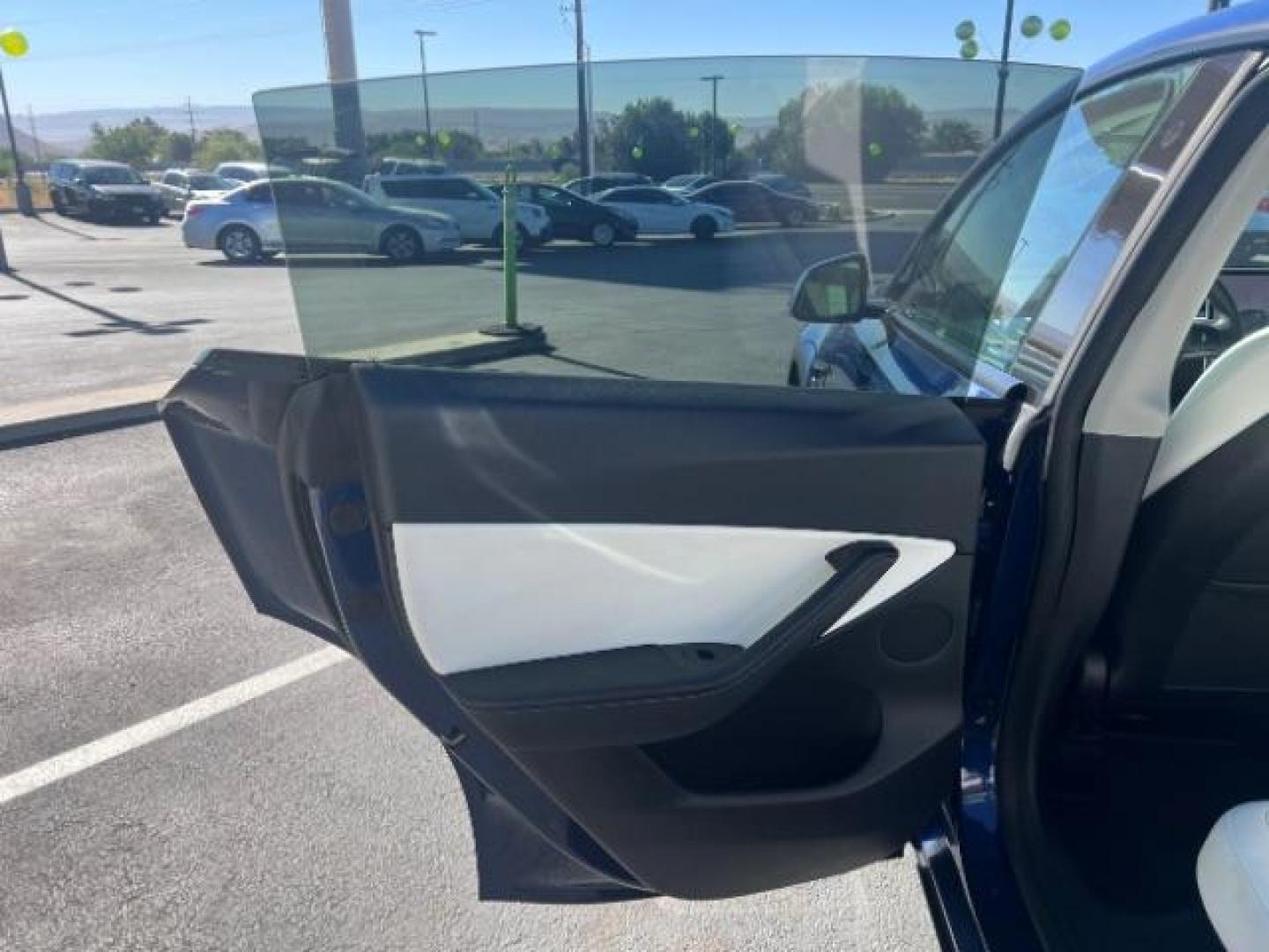 2021 Deep Blue Metallic /Black Tesla Model Y Long Range Dual Motor All-Wheel Drive (5YJYGDEE2MF) with an Electric engine, AUTOMATIC transmission, located at 1865 East Red Hills Pkwy, St. George, 84770, (435) 628-0023, 37.120850, -113.543640 - Excellent Model Y in rare color combo blue on white. Gets 260 miles on full charge. Full battery and motor warranty up to 120k miles Financing for ALL credit types. Aftermarket battery warranty available. We are THE southern Utah Tesla Experts. Call or text for more info - Photo#20